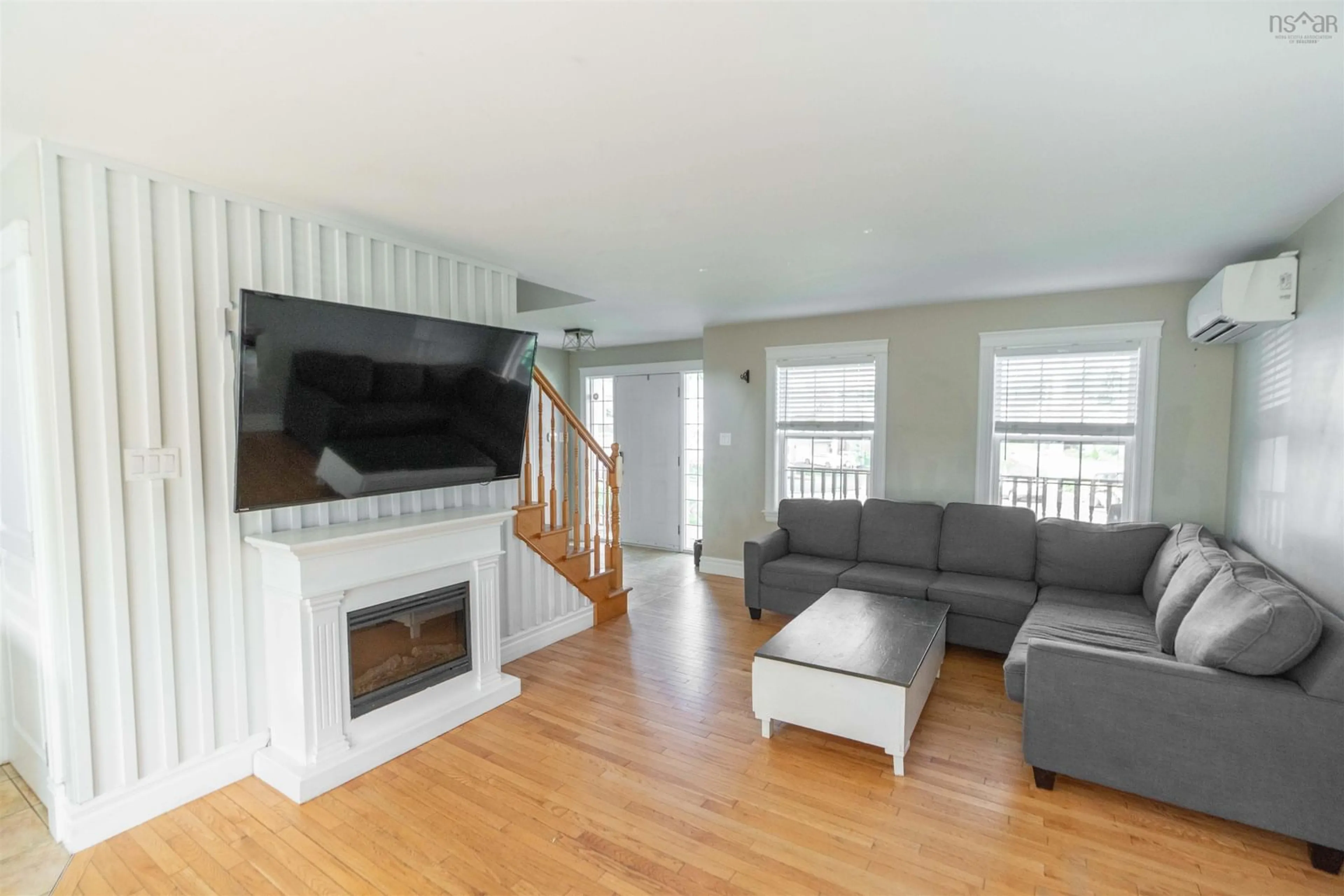 Living room with furniture, wood/laminate floor for 39 Slicers Lane, Middle Sackville Nova Scotia B4E 0A7