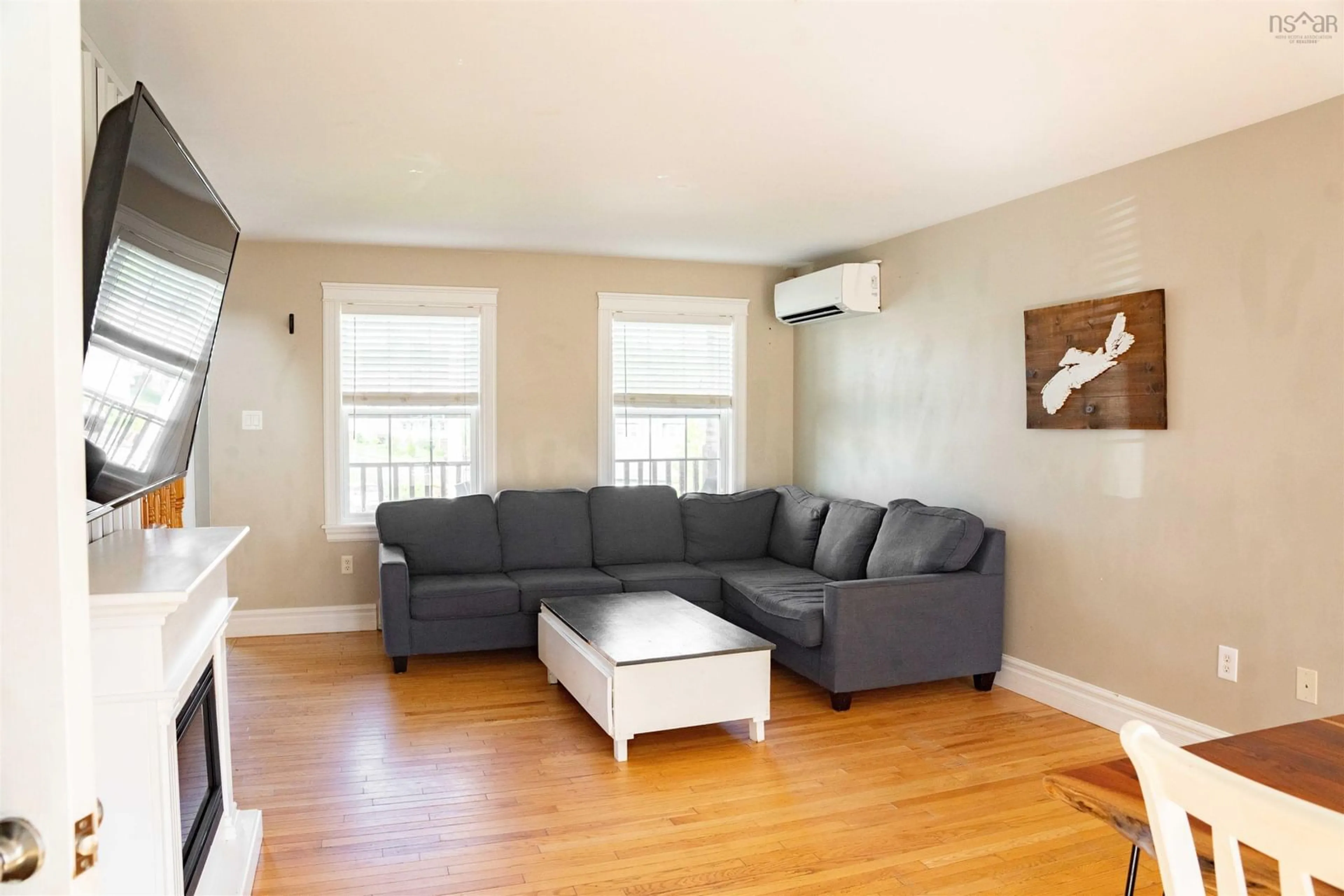 Living room with furniture, wood/laminate floor for 39 Slicers Lane, Middle Sackville Nova Scotia B4E 0A7