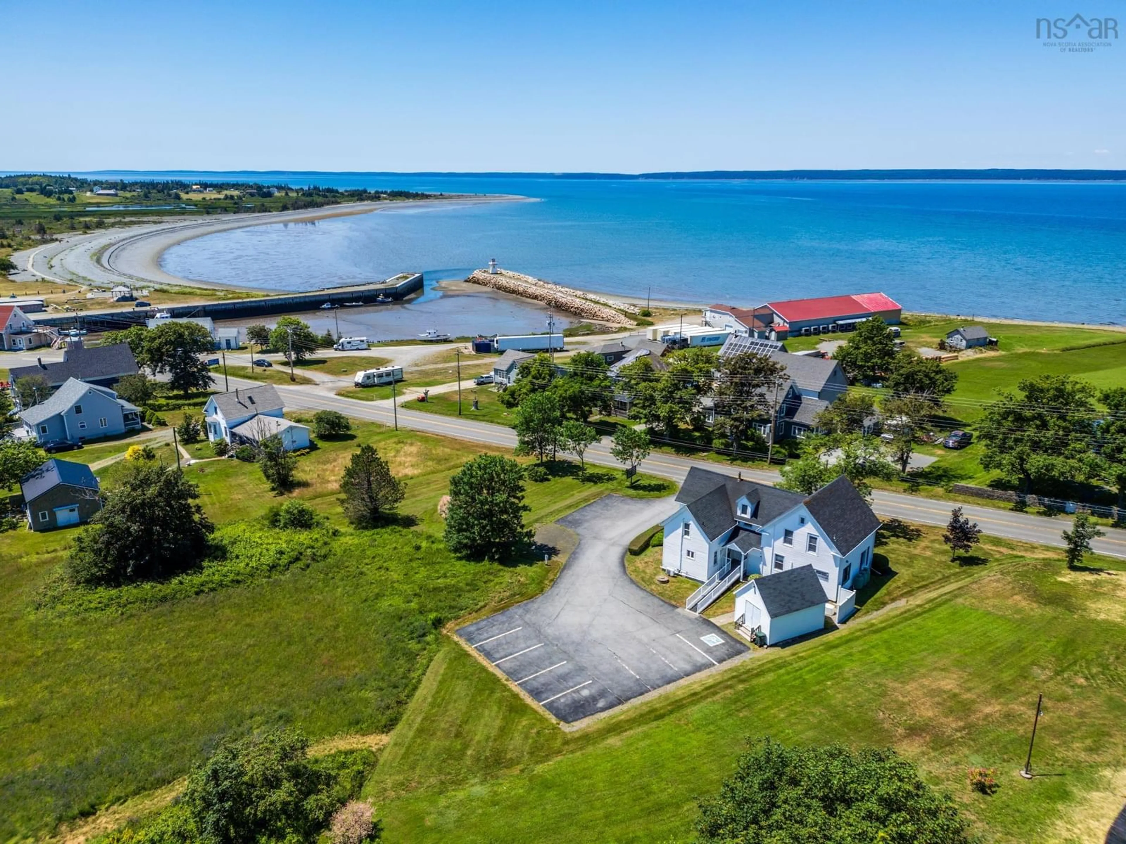 A pic from outside/outdoor area/front of a property/back of a property/a pic from drone, water/lake/river/ocean view for 3300 Highway 1, Belliveaus Cove Nova Scotia B0W 2J0