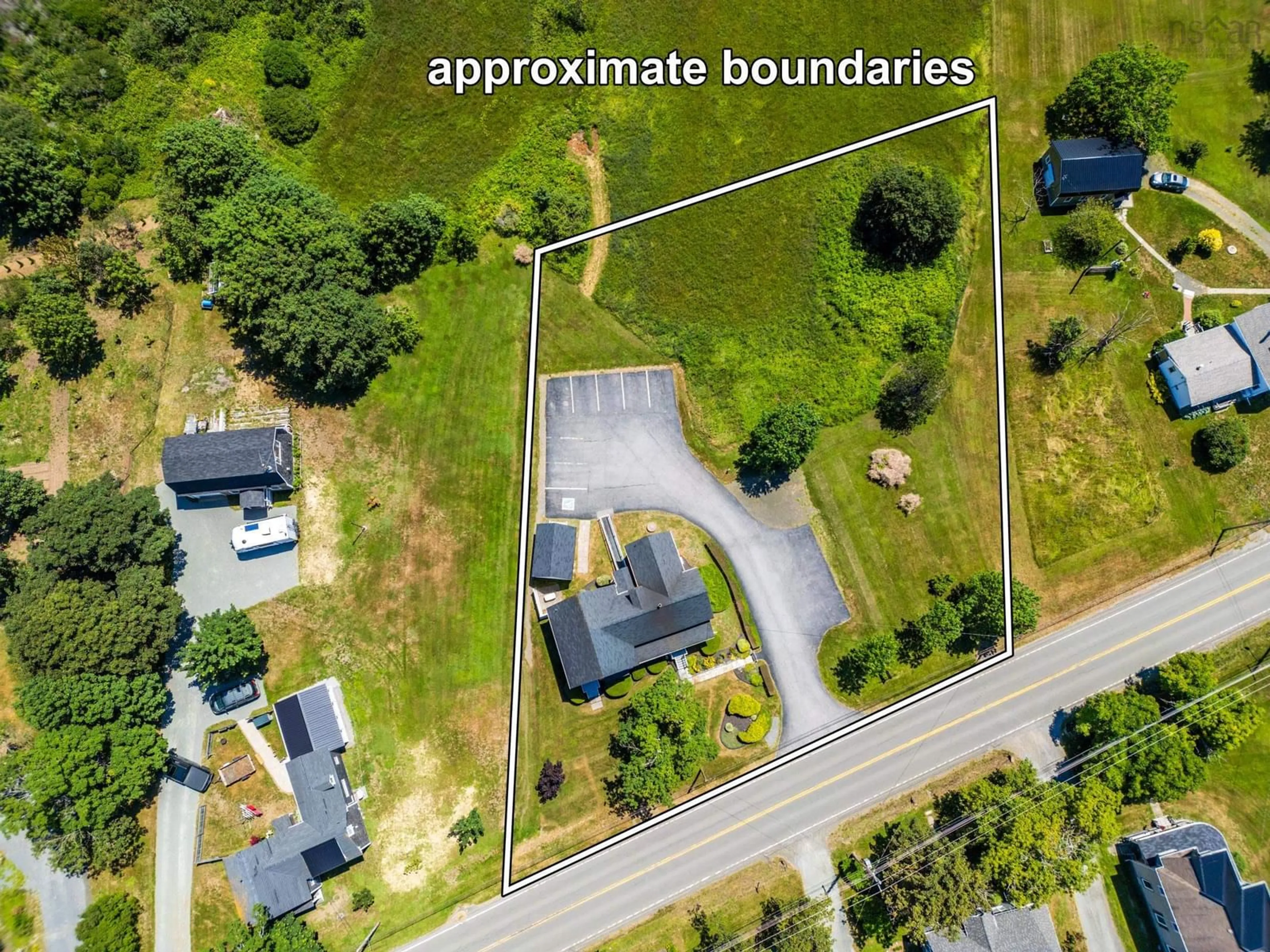 A pic from outside/outdoor area/front of a property/back of a property/a pic from drone, street for 3300 Highway 1, Belliveaus Cove Nova Scotia B0W 2J0