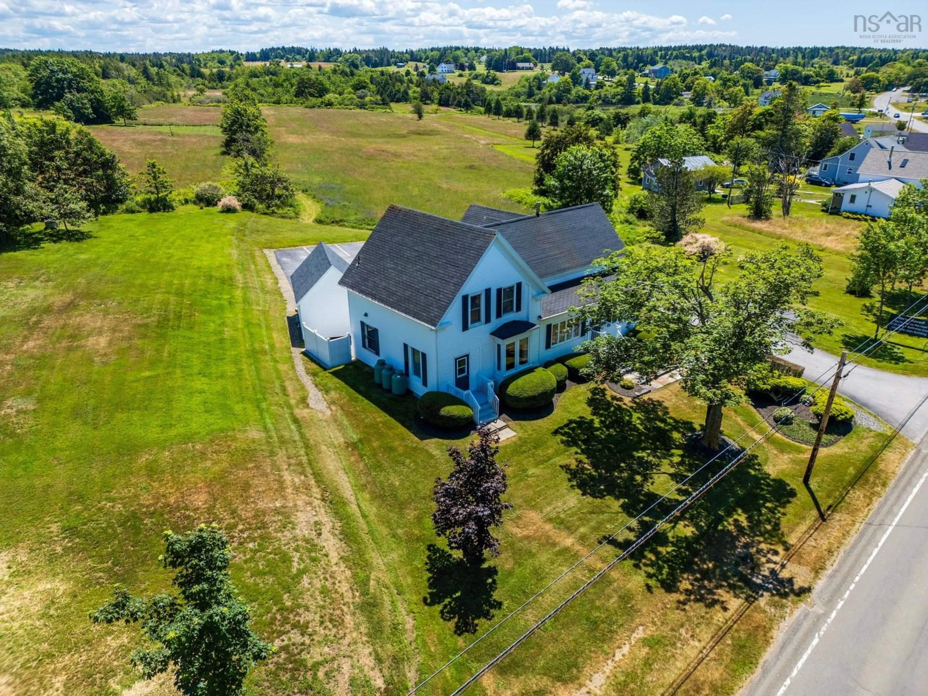A pic from outside/outdoor area/front of a property/back of a property/a pic from drone, water/lake/river/ocean view for 3300 Highway 1, Belliveaus Cove Nova Scotia B0W 2J0