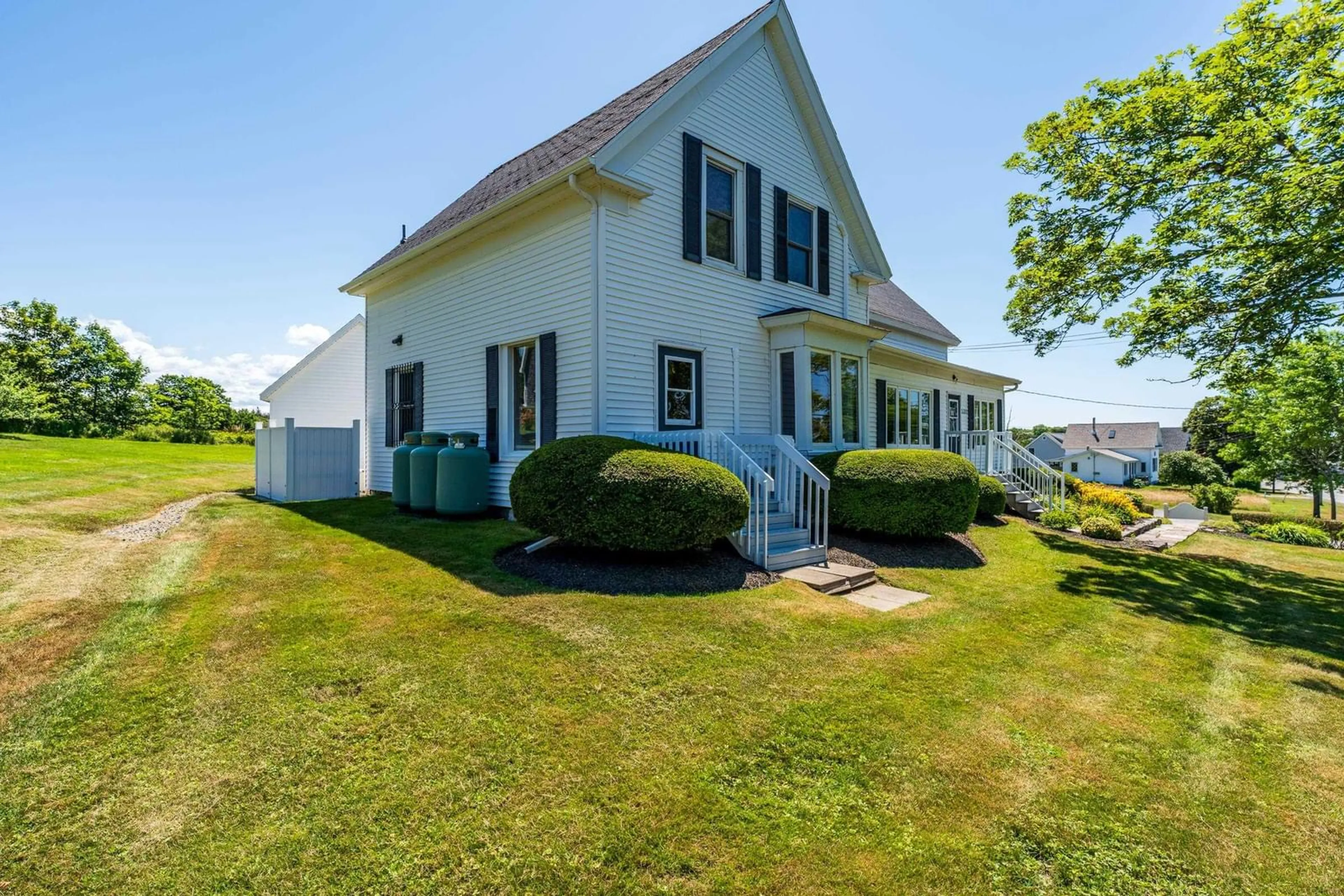 A pic from outside/outdoor area/front of a property/back of a property/a pic from drone, water/lake/river/ocean view for 3300 Highway 1, Belliveaus Cove Nova Scotia B0W 2J0