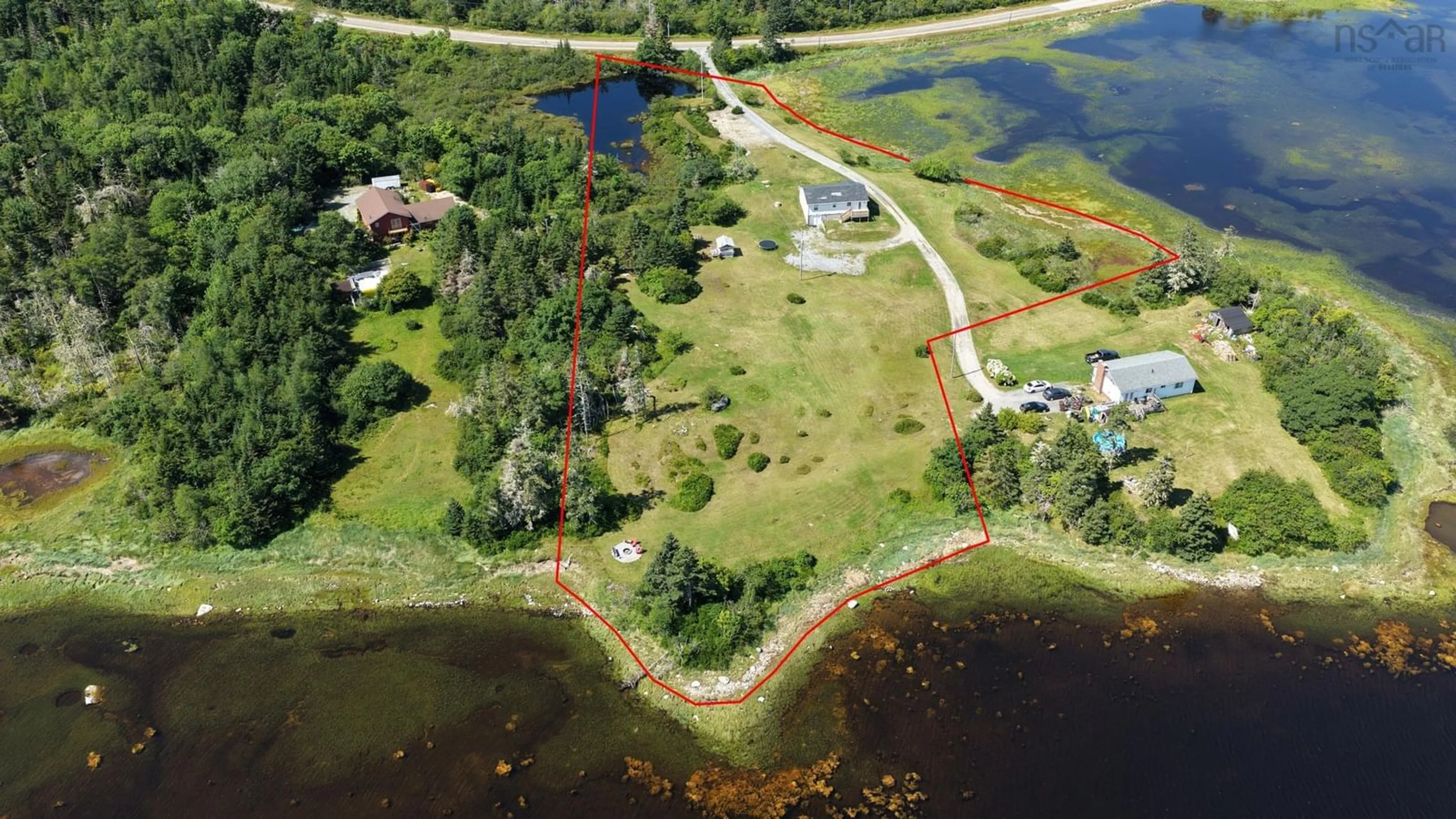 A pic from outside/outdoor area/front of a property/back of a property/a pic from drone, water/lake/river/ocean view for Port Latour Road Eel Bay #1185, Port La Tour Nova Scotia B0W 3L0