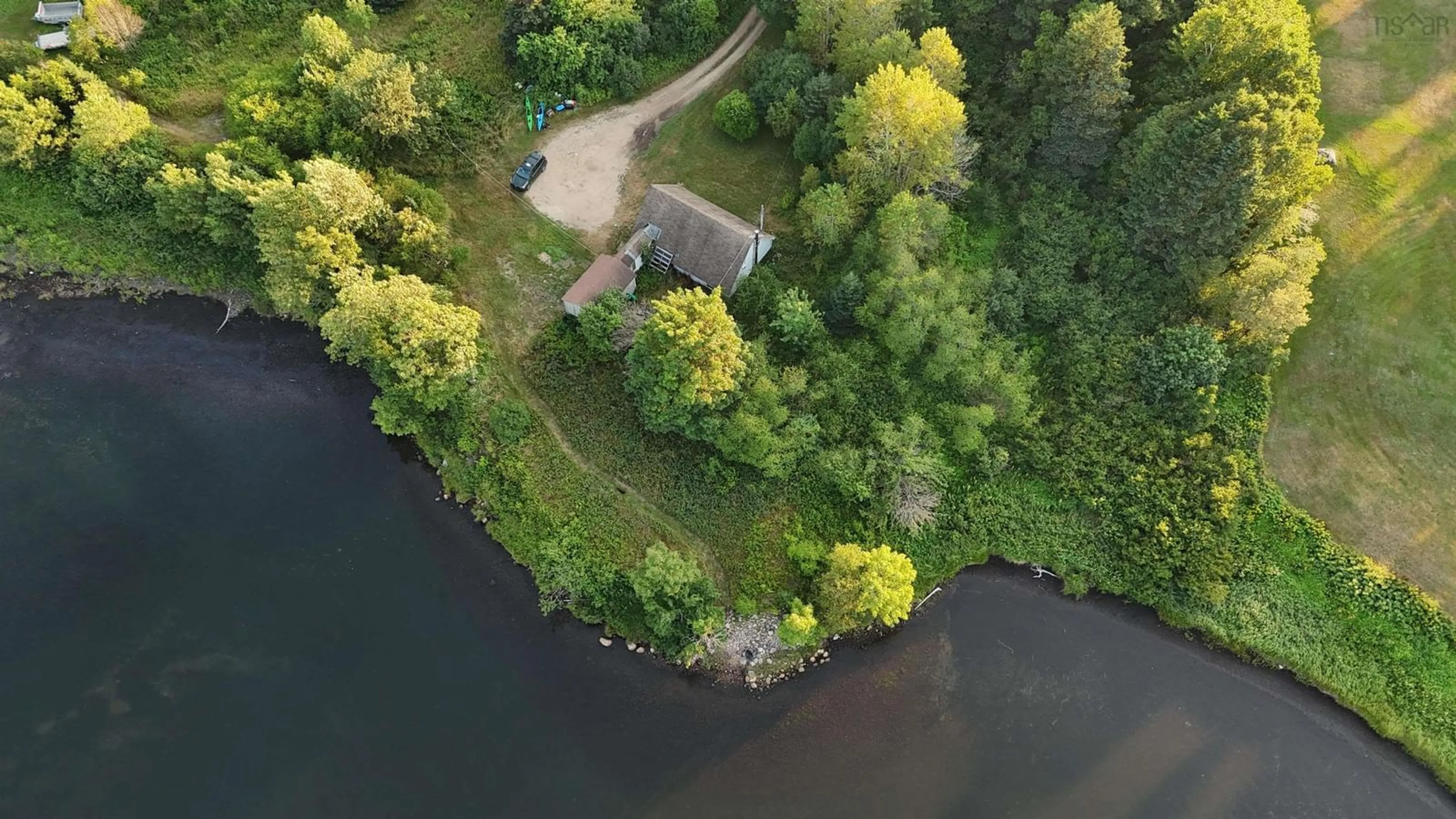 A pic from outside/outdoor area/front of a property/back of a property/a pic from drone, water/lake/river/ocean view for 29971 Cabot Trail, South Harbour Nova Scotia B0C 1G0