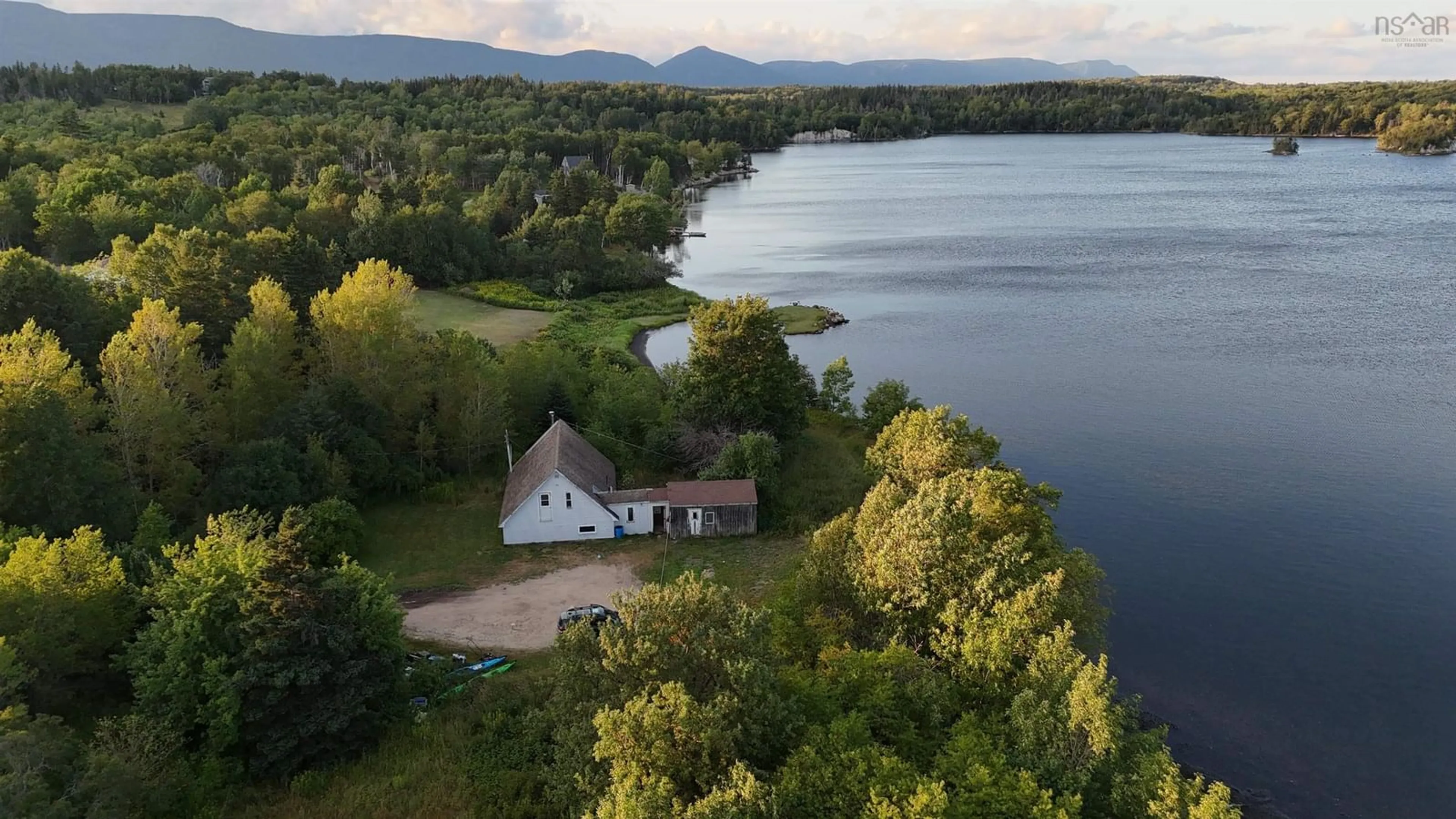 A pic from outside/outdoor area/front of a property/back of a property/a pic from drone, water/lake/river/ocean view for 29971 Cabot Trail, South Harbour Nova Scotia B0C 1G0