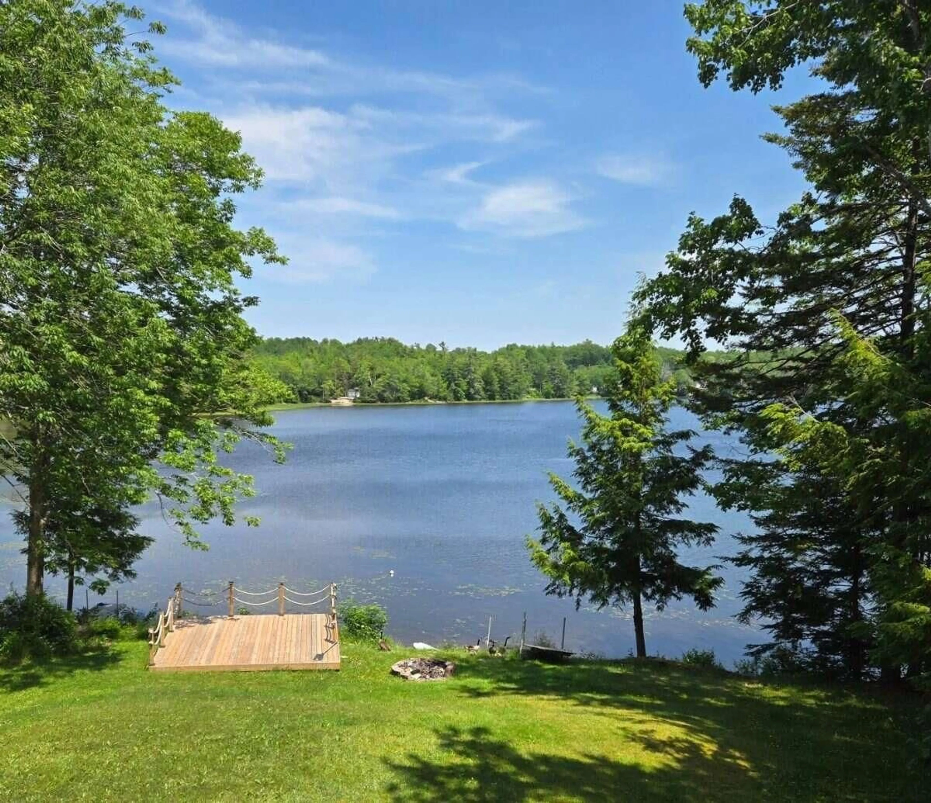 A pic from outside/outdoor area/front of a property/back of a property/a pic from drone, water/lake/river/ocean view for 224 Tucker Lake Rd, Beaver Bank Nova Scotia B4G 1C3