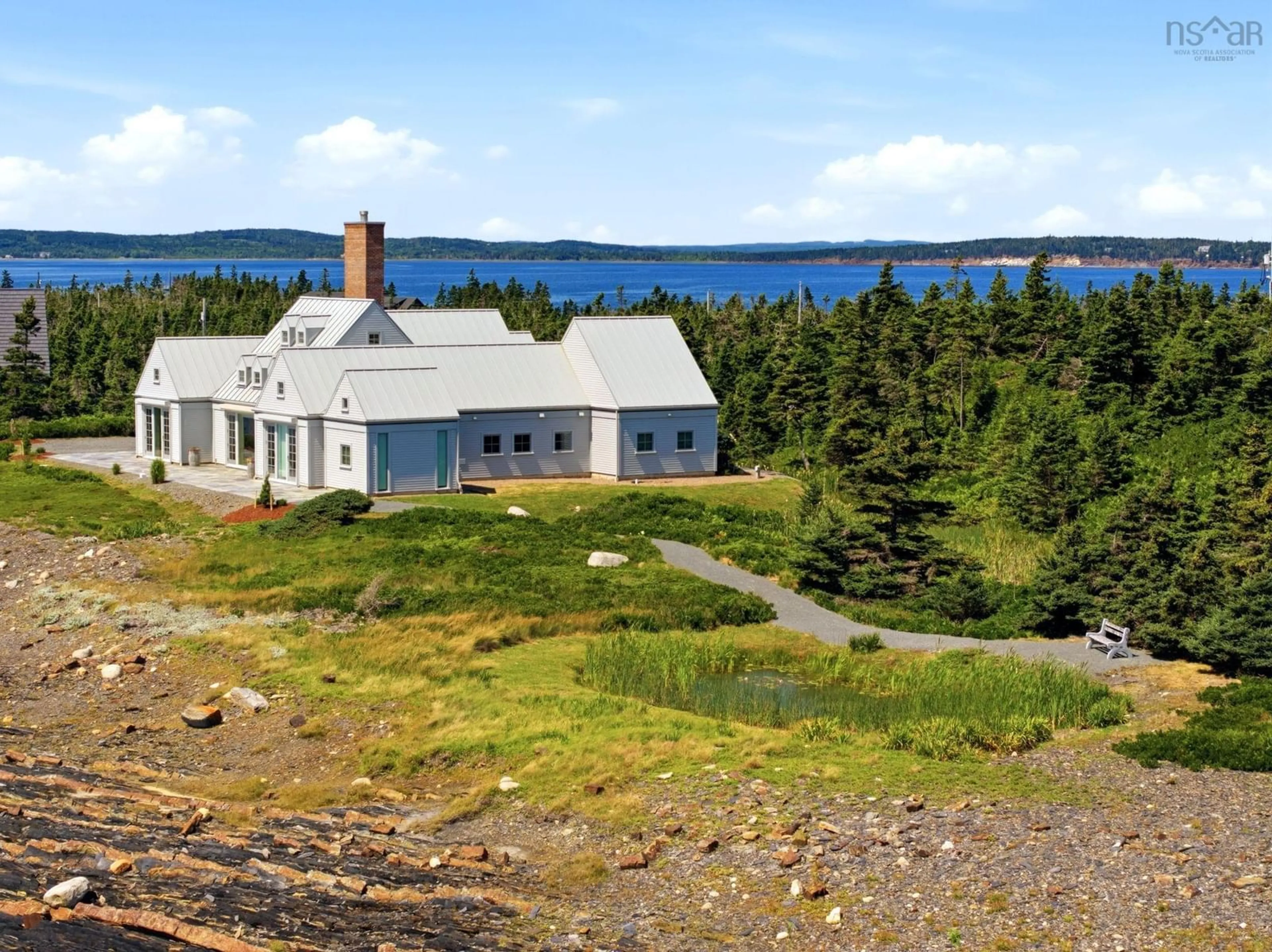 A pic from outside/outdoor area/front of a property/back of a property/a pic from drone, water/lake/river/ocean view for 604 Middle Rd, Kingsburg Nova Scotia B0J 2X0