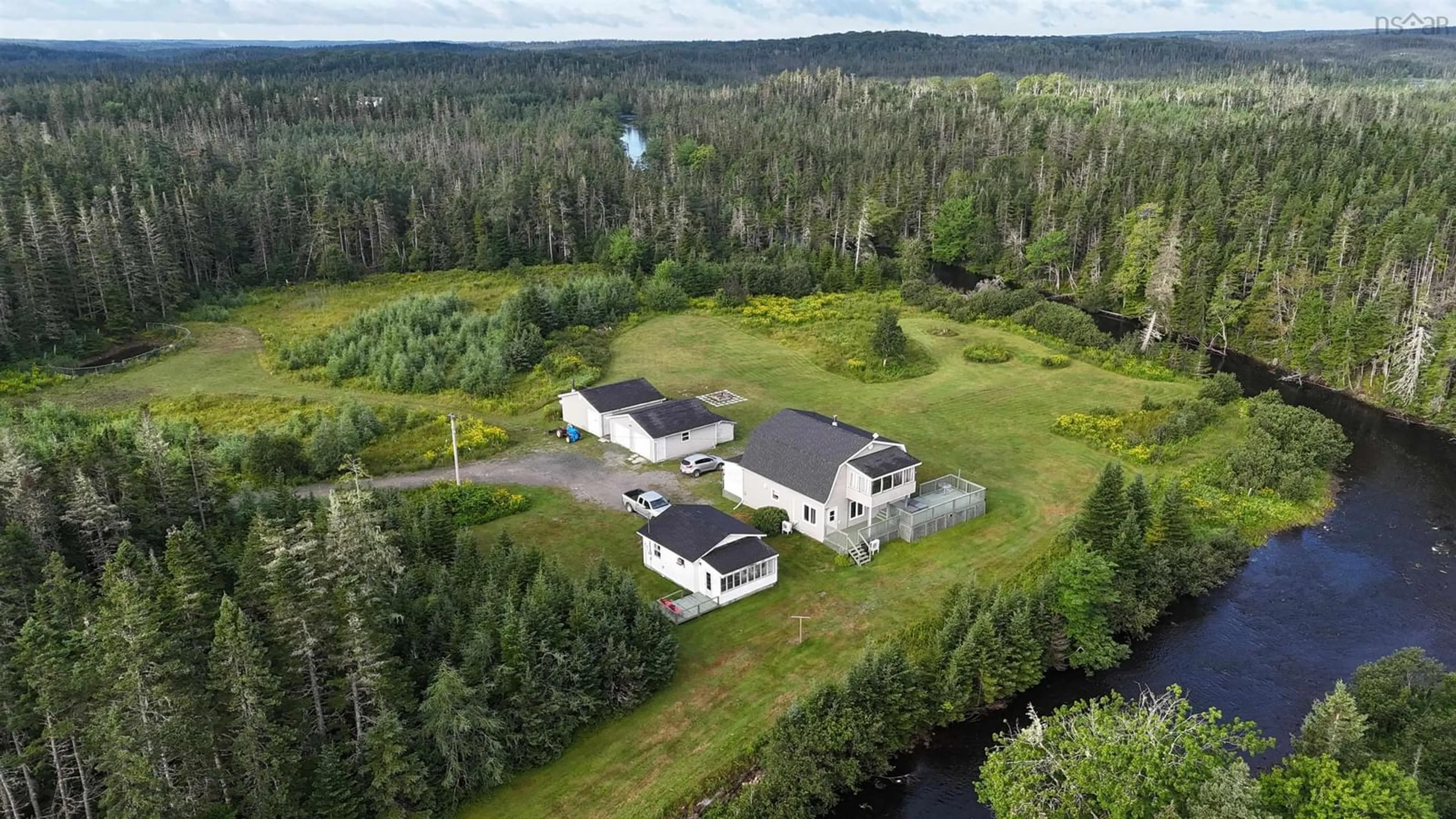 A pic from outside/outdoor area/front of a property/back of a property/a pic from drone, water/lake/river/ocean view for 1235 Loch Lomond Rd, Grand River Falls Nova Scotia B0E 1M0