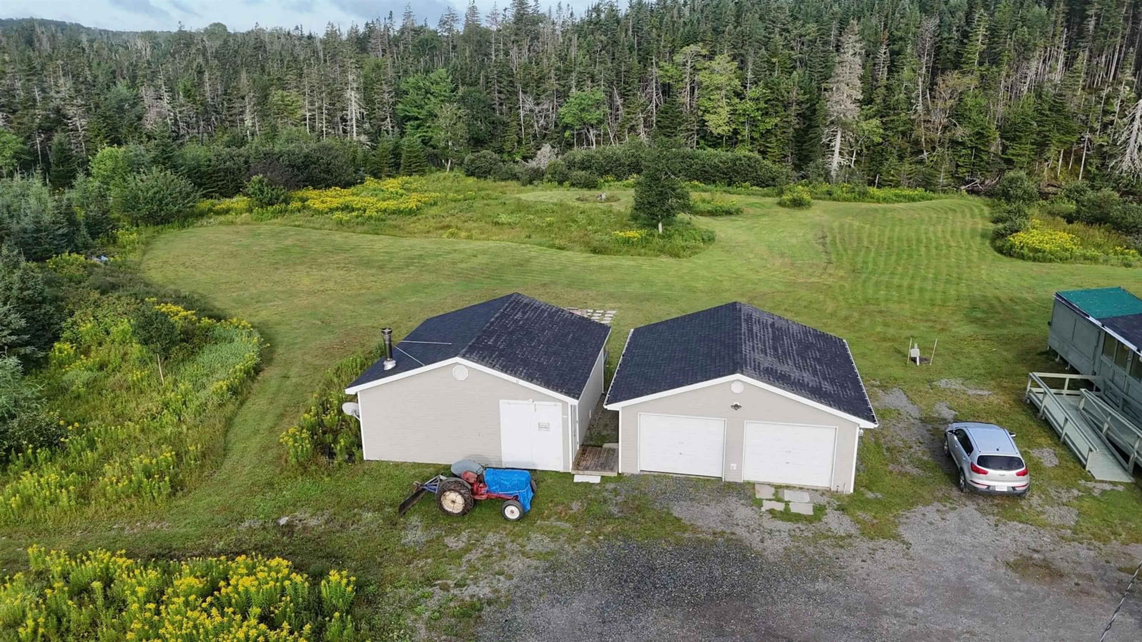 A pic from outside/outdoor area/front of a property/back of a property/a pic from drone, building for 1235 Loch Lomond Rd, Grand River Falls Nova Scotia B0E 1M0