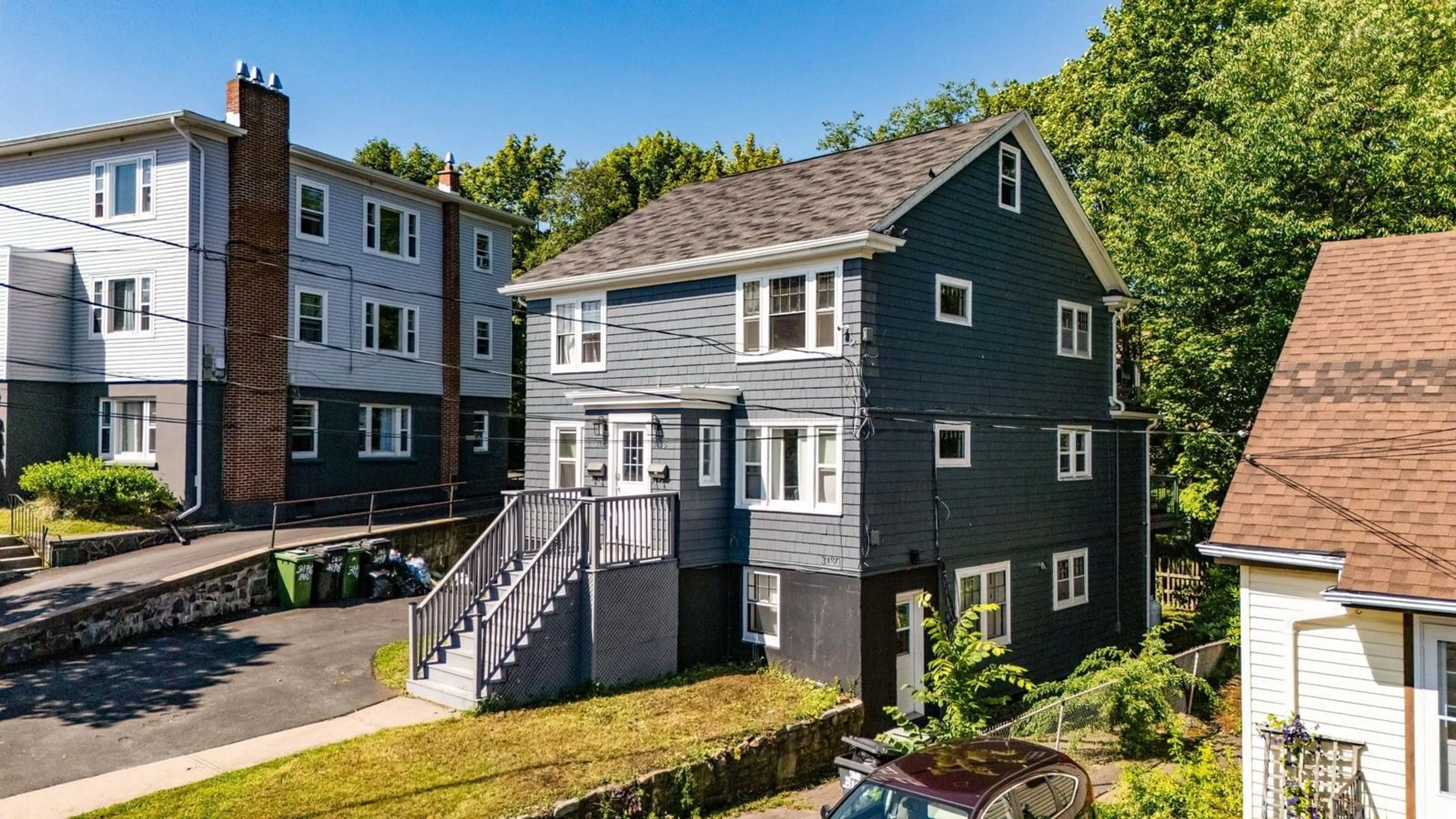 A pic from outside/outdoor area/front of a property/back of a property/a pic from drone, street for 3176/78/80 Stanford St, Halifax Nova Scotia B3L 4E1