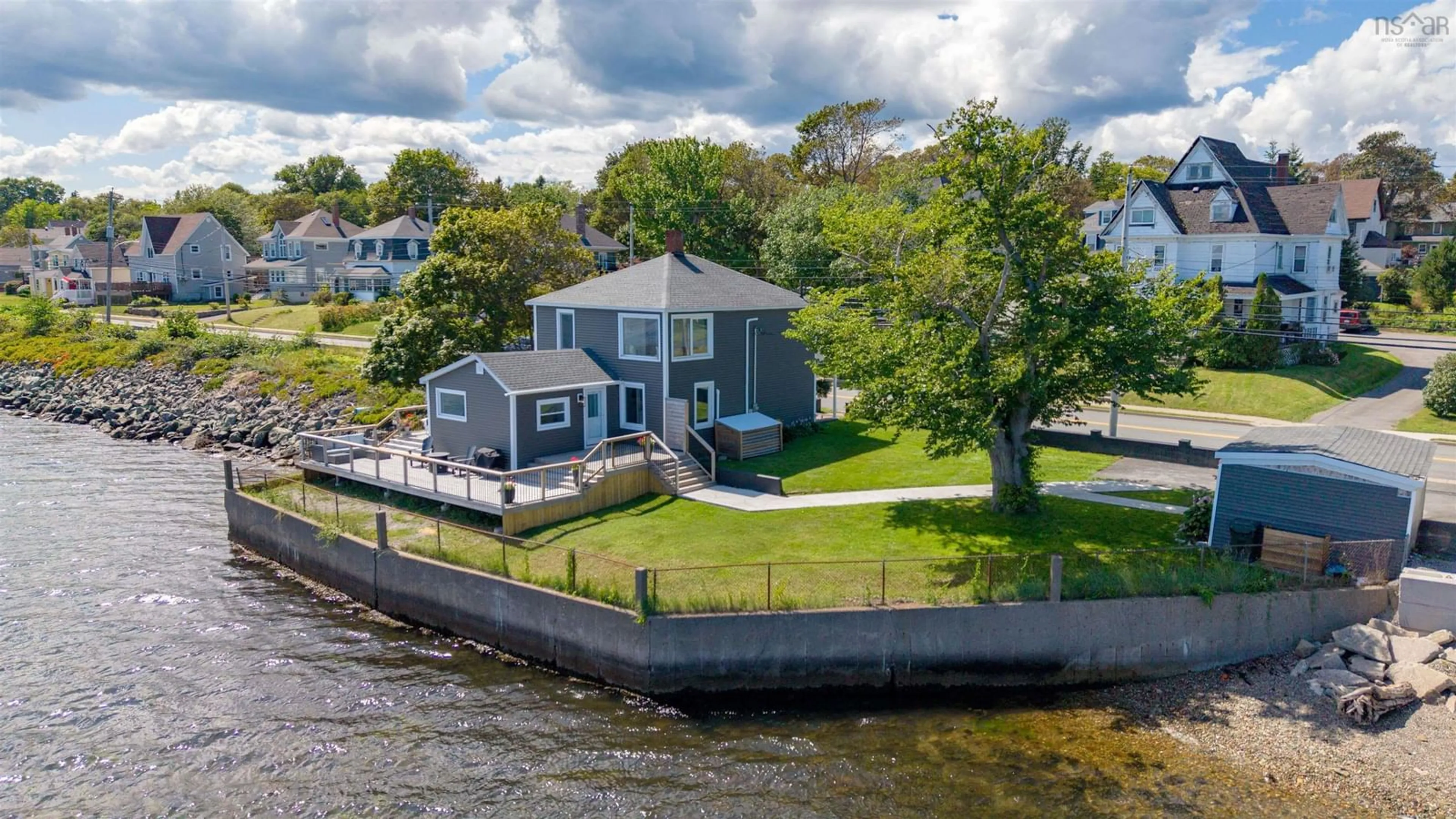 A pic from outside/outdoor area/front of a property/back of a property/a pic from drone, water/lake/river/ocean view for 87 Queen St, North Sydney Nova Scotia B2A 1A7