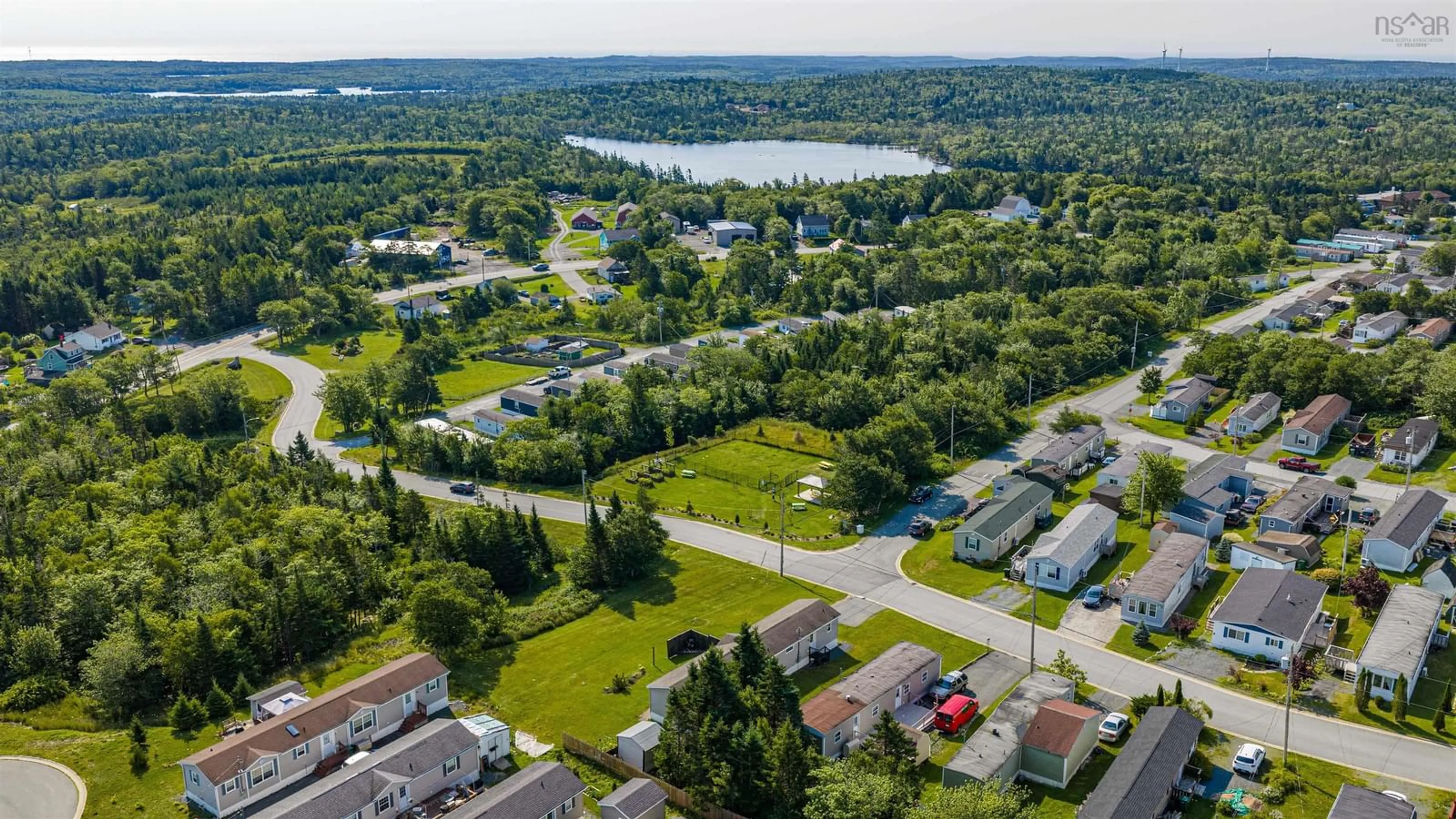 A pic from outside/outdoor area/front of a property/back of a property/a pic from drone, water/lake/river/ocean view for 18 Bellwood Dr, Harrietsfield Nova Scotia B3V 1A6