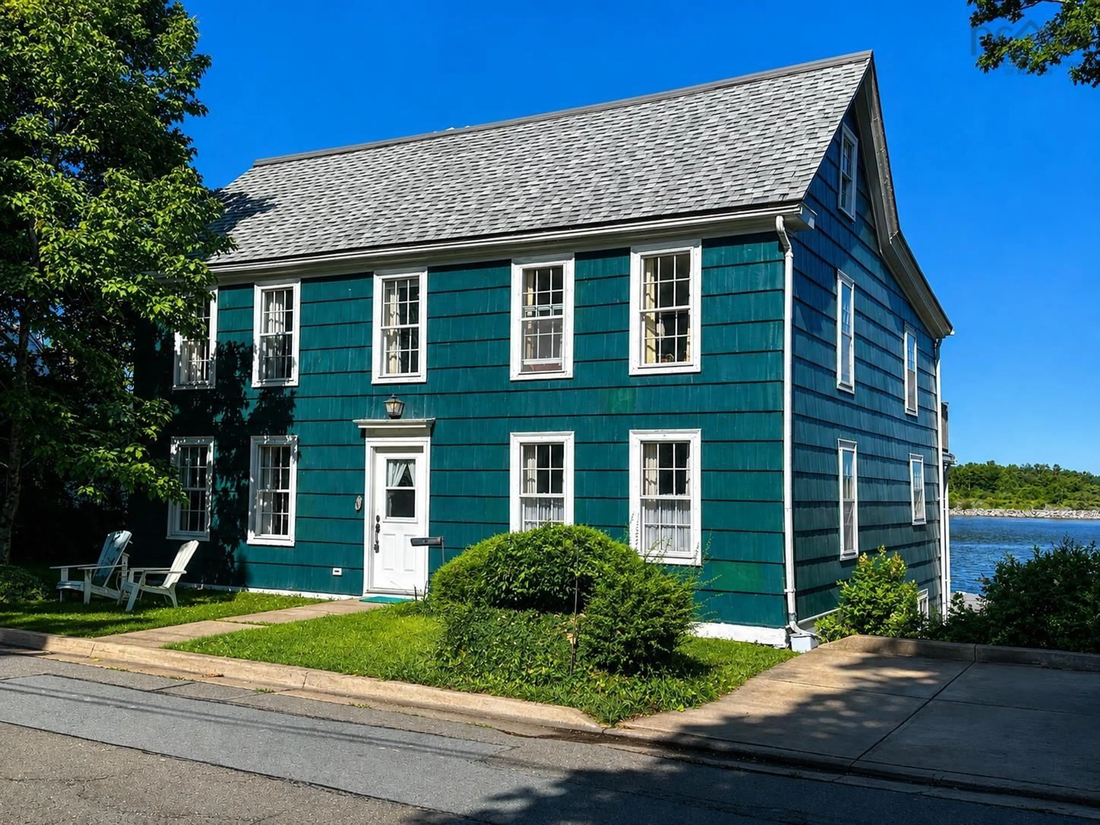 Home with vinyl exterior material, street for 32 Main St, Liverpool Nova Scotia B0T 1K0