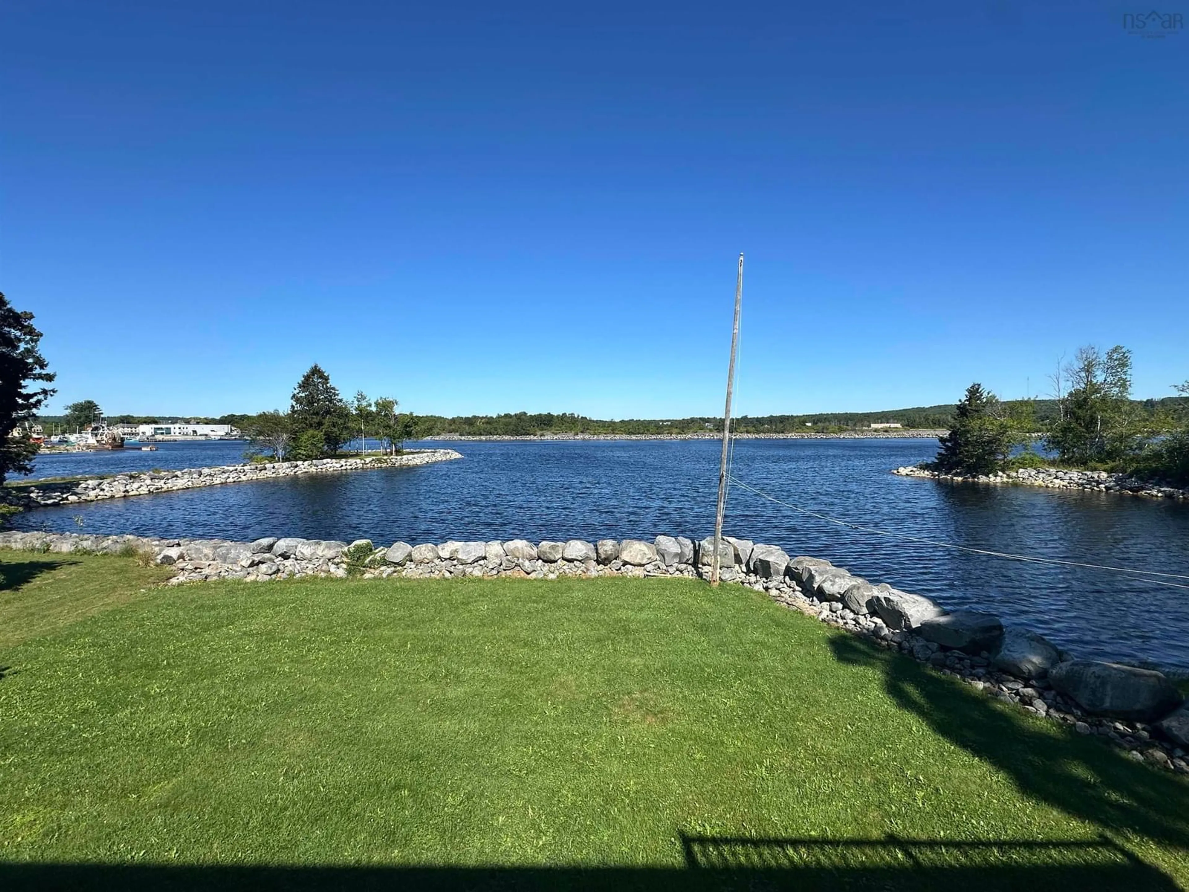 A pic from outside/outdoor area/front of a property/back of a property/a pic from drone, water/lake/river/ocean view for 32 Main St, Liverpool Nova Scotia B0T 1K0