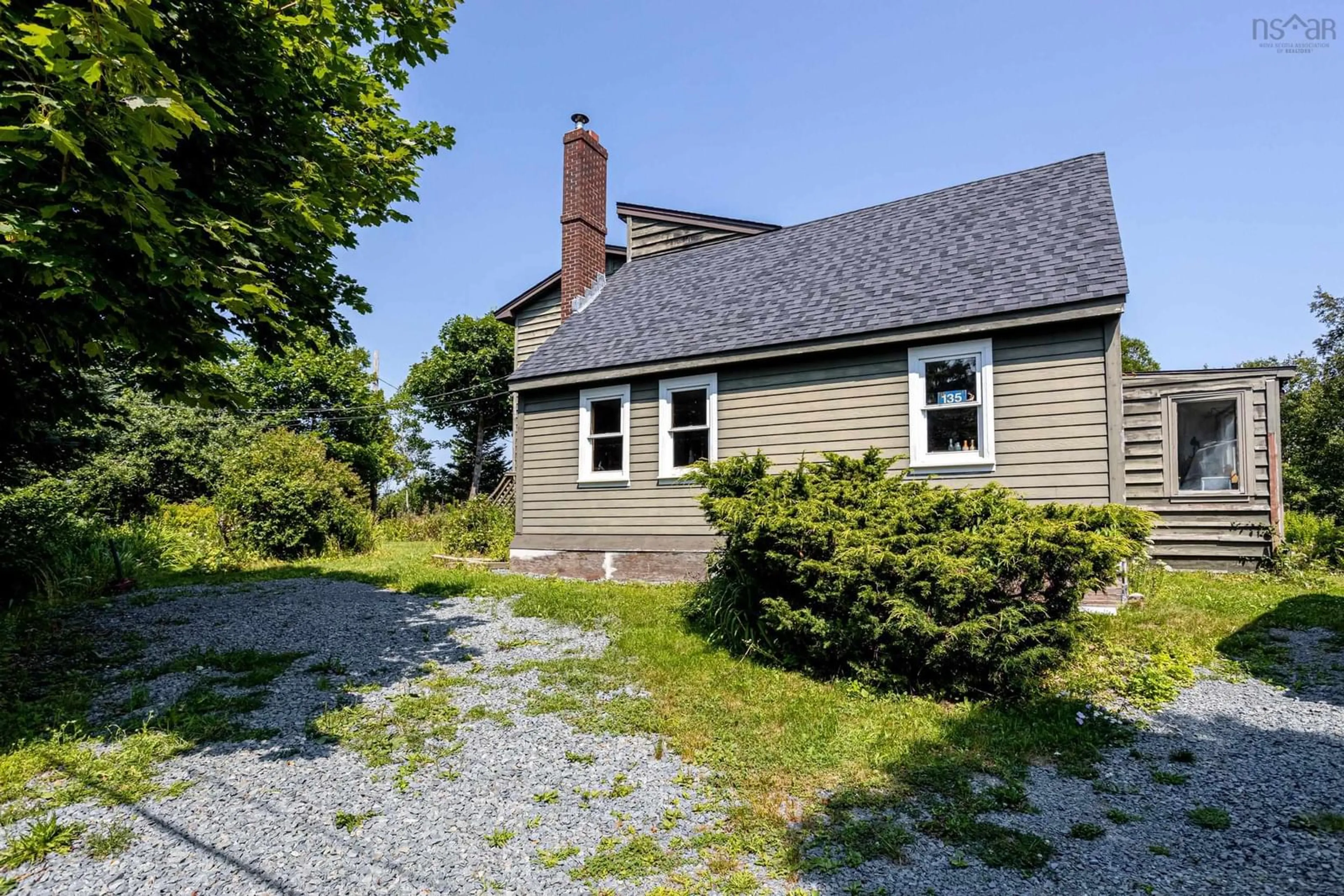 A pic from outside/outdoor area/front of a property/back of a property/a pic from drone, street for 135 Village Rd, Herring Cove Nova Scotia B3V 1H2