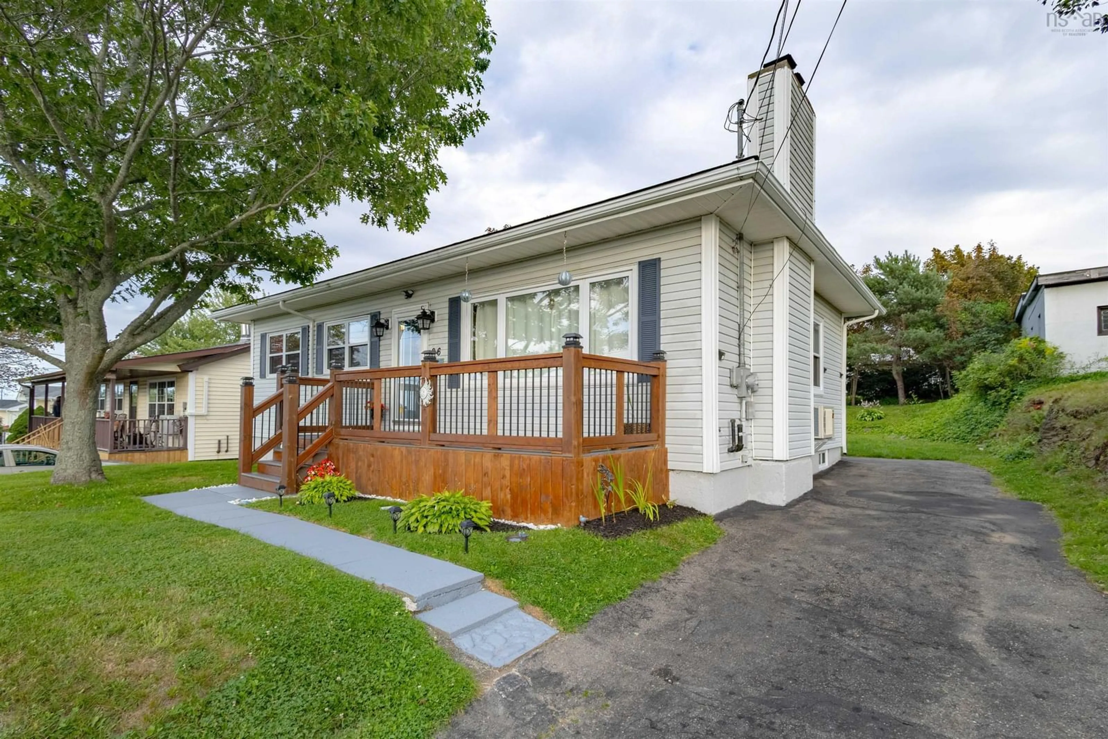 Home with vinyl exterior material, street for 26 Grove St, Sydney Nova Scotia B1P 3M8