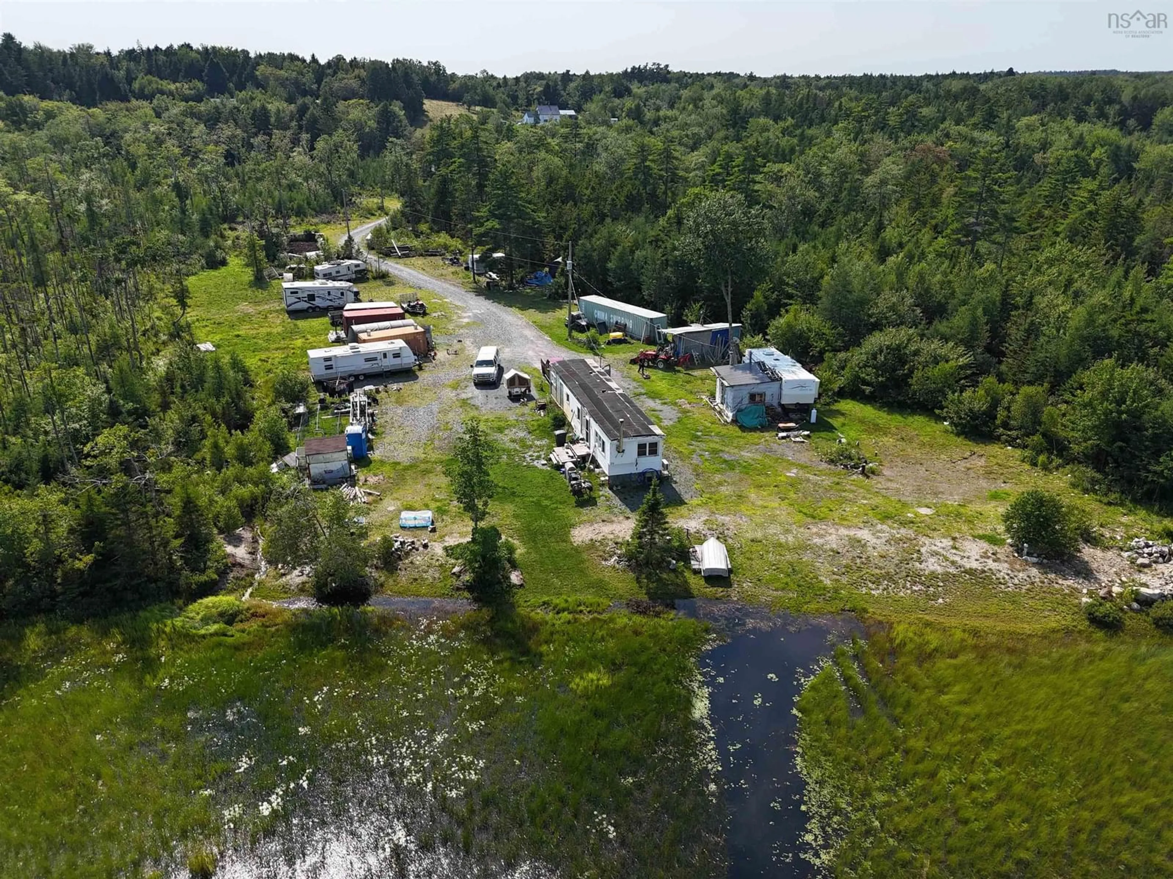 A pic from outside/outdoor area/front of a property/back of a property/a pic from drone, water/lake/river/ocean view for 73 Somerset Rd, Italy Cross Nova Scotia B4V 0M1