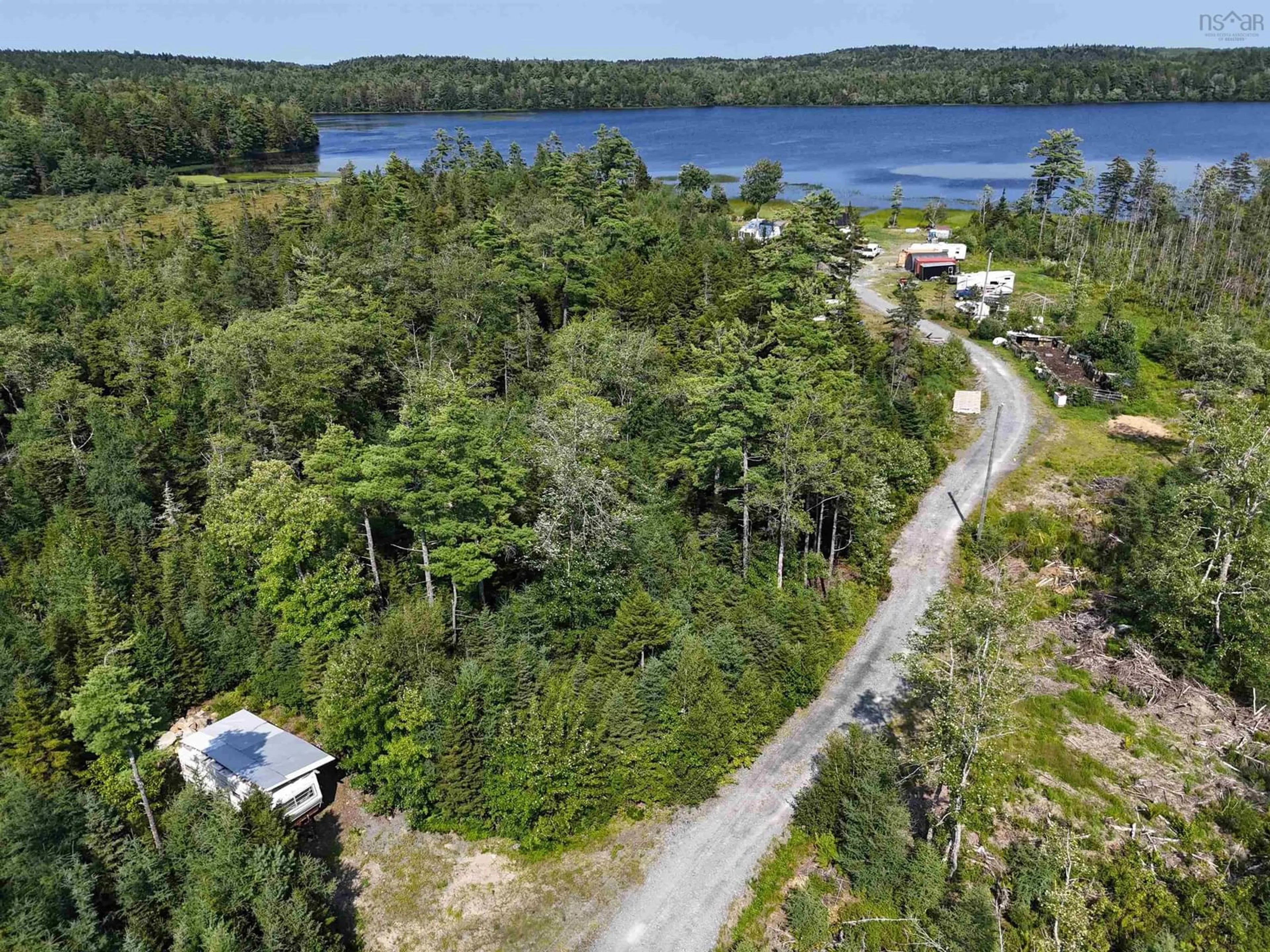 A pic from outside/outdoor area/front of a property/back of a property/a pic from drone, water/lake/river/ocean view for 73 Somerset Rd, Italy Cross Nova Scotia B4V 0M1