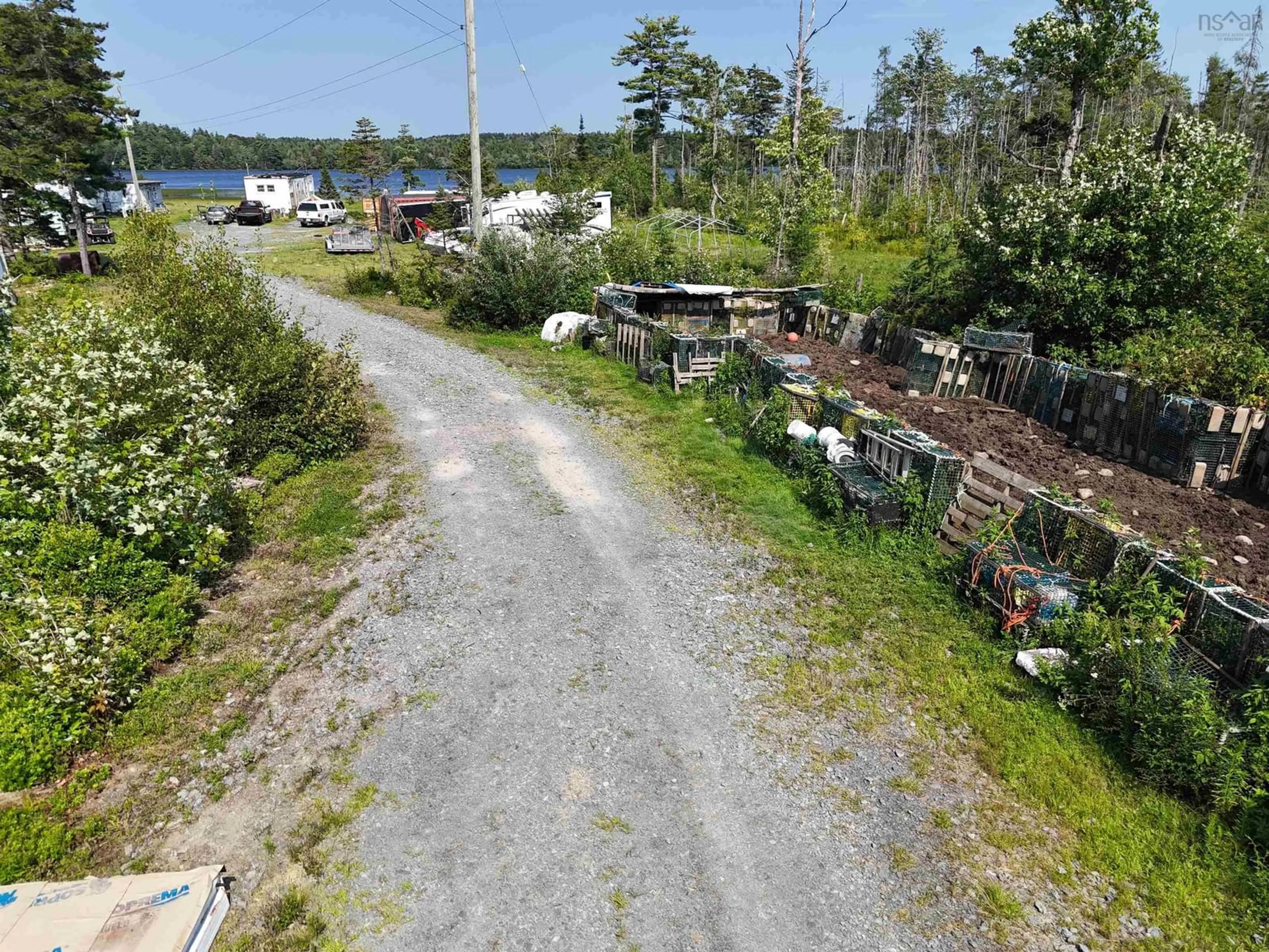 A pic from outside/outdoor area/front of a property/back of a property/a pic from drone, unknown for 73 Somerset Rd, Italy Cross Nova Scotia B4V 0M1