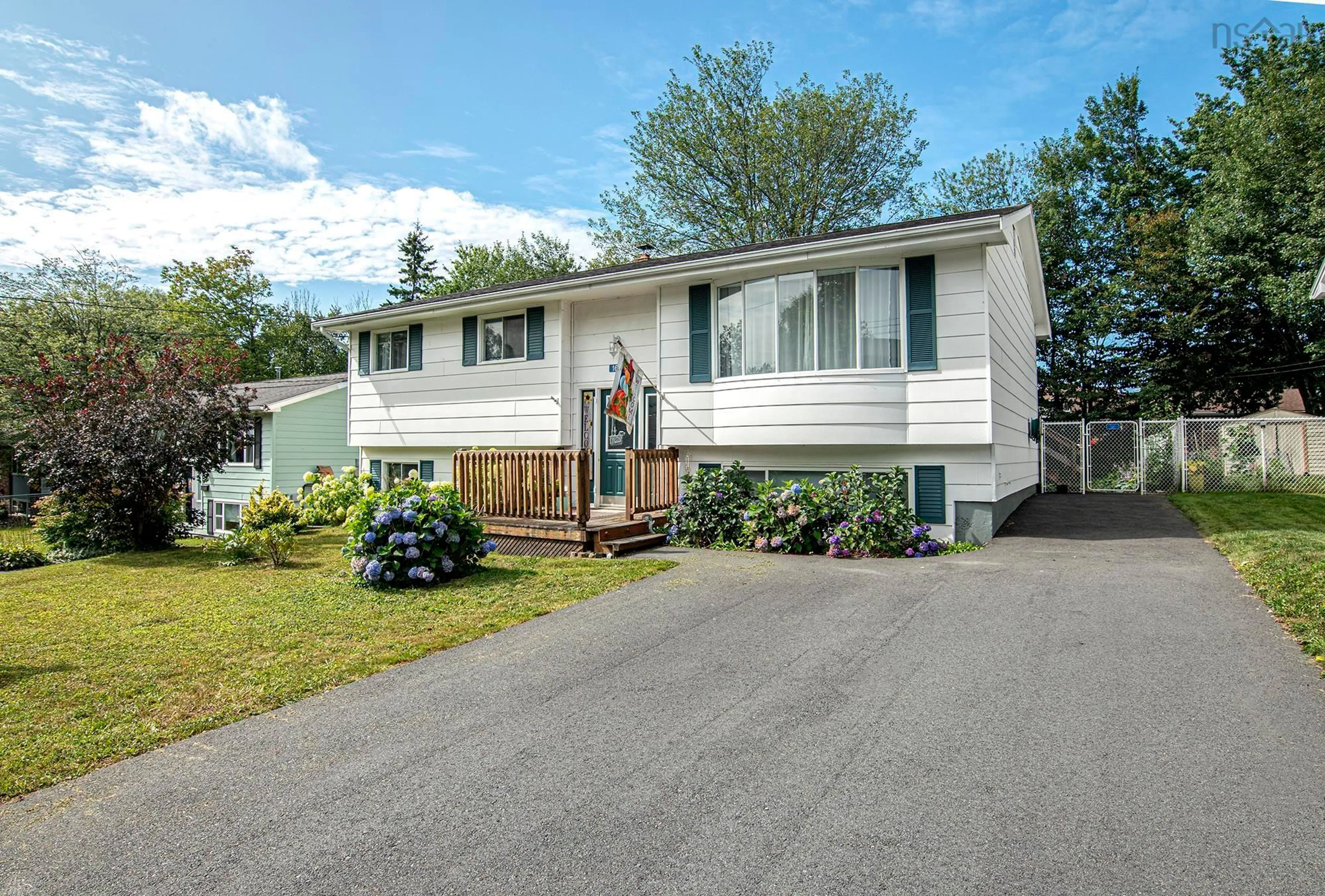 Home with vinyl exterior material, street for 1653 Riverside Dr, Lower Sackville Nova Scotia B4C 2Y7