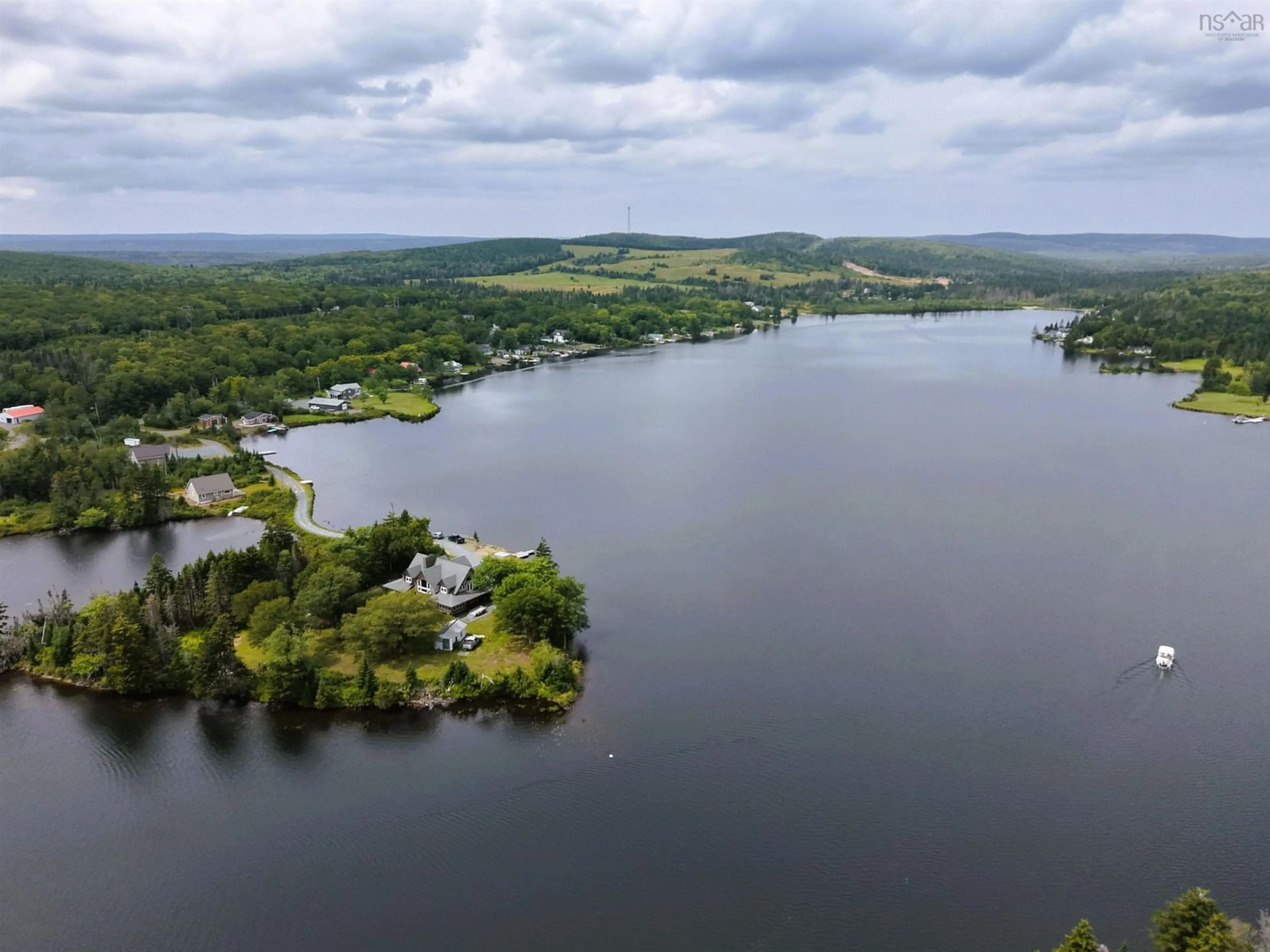 A pic from outside/outdoor area/front of a property/back of a property/a pic from drone, water/lake/river/ocean view for 47 Pats Blvd, Sutherlands Lake Nova Scotia B0M 1M0