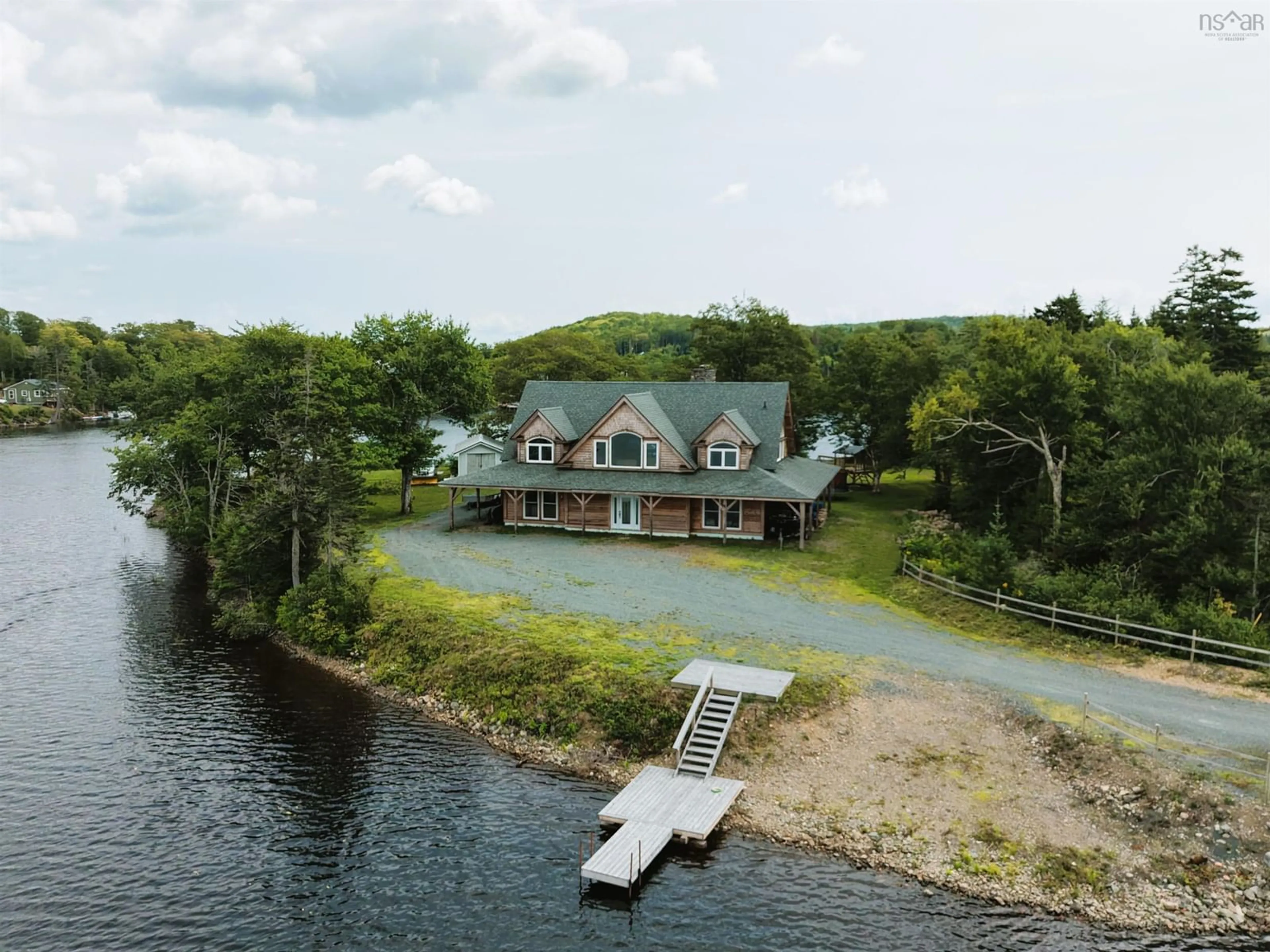 A pic from outside/outdoor area/front of a property/back of a property/a pic from drone, water/lake/river/ocean view for 47 Pats Blvd, Sutherlands Lake Nova Scotia B0M 1M0