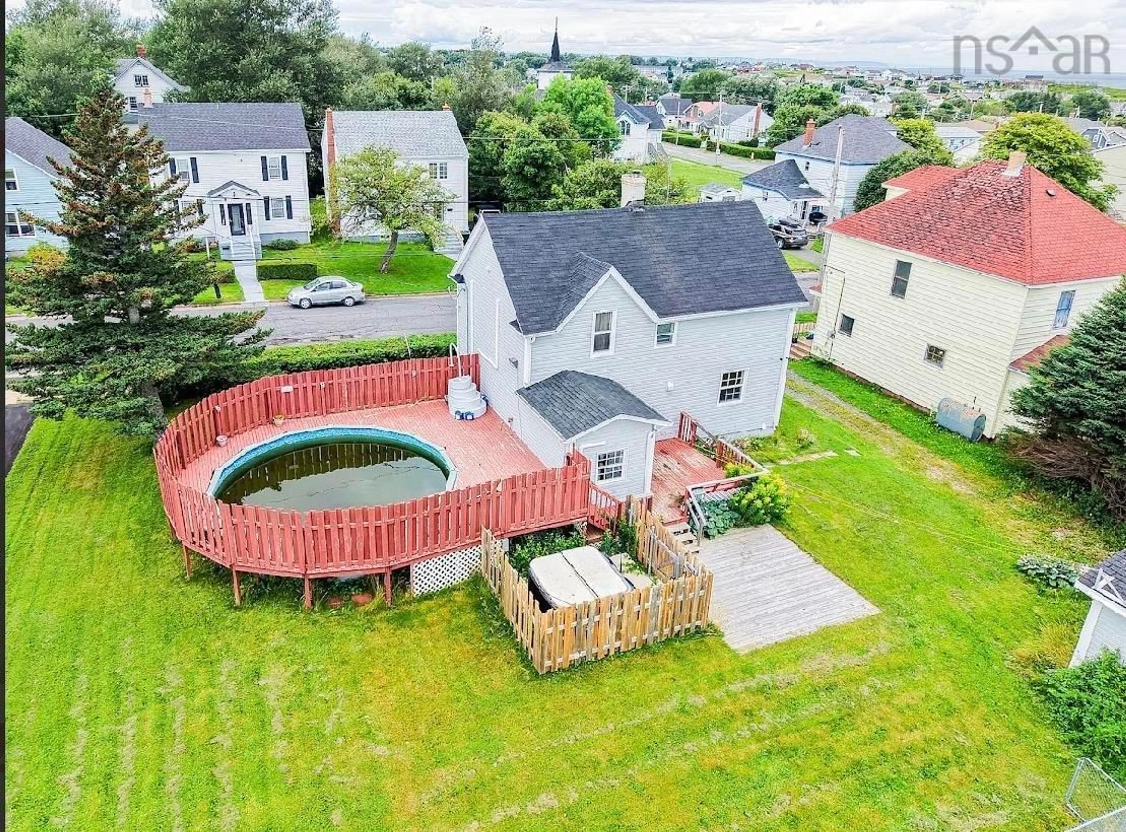 A pic from outside/outdoor area/front of a property/back of a property/a pic from drone, unknown for 370 Hudson St, New Waterford Nova Scotia B1H 3P6