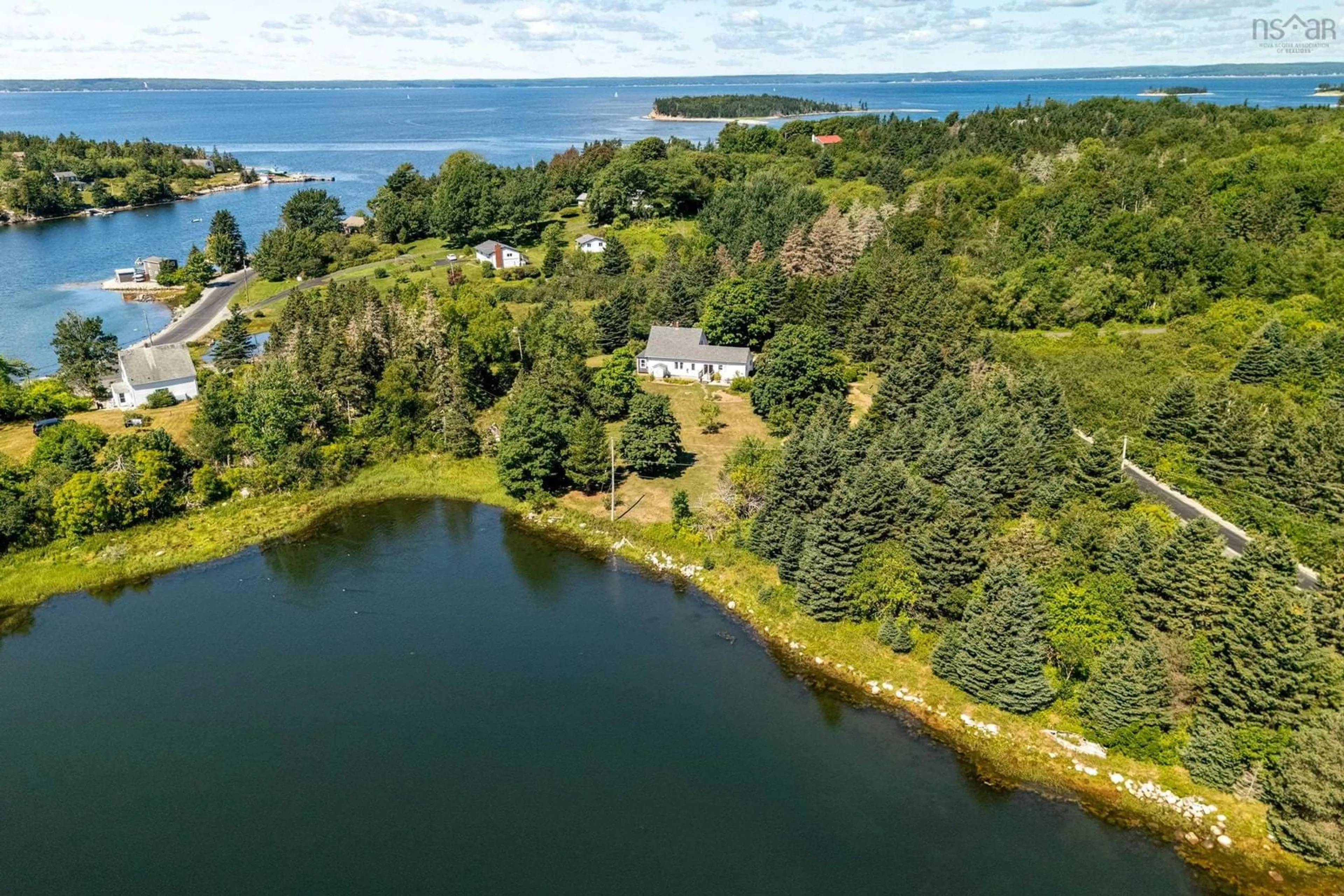 A pic from outside/outdoor area/front of a property/back of a property/a pic from drone, water/lake/river/ocean view for 91 Boutiliers Cove Rd, Hacketts Cove Nova Scotia B3Z 3J5