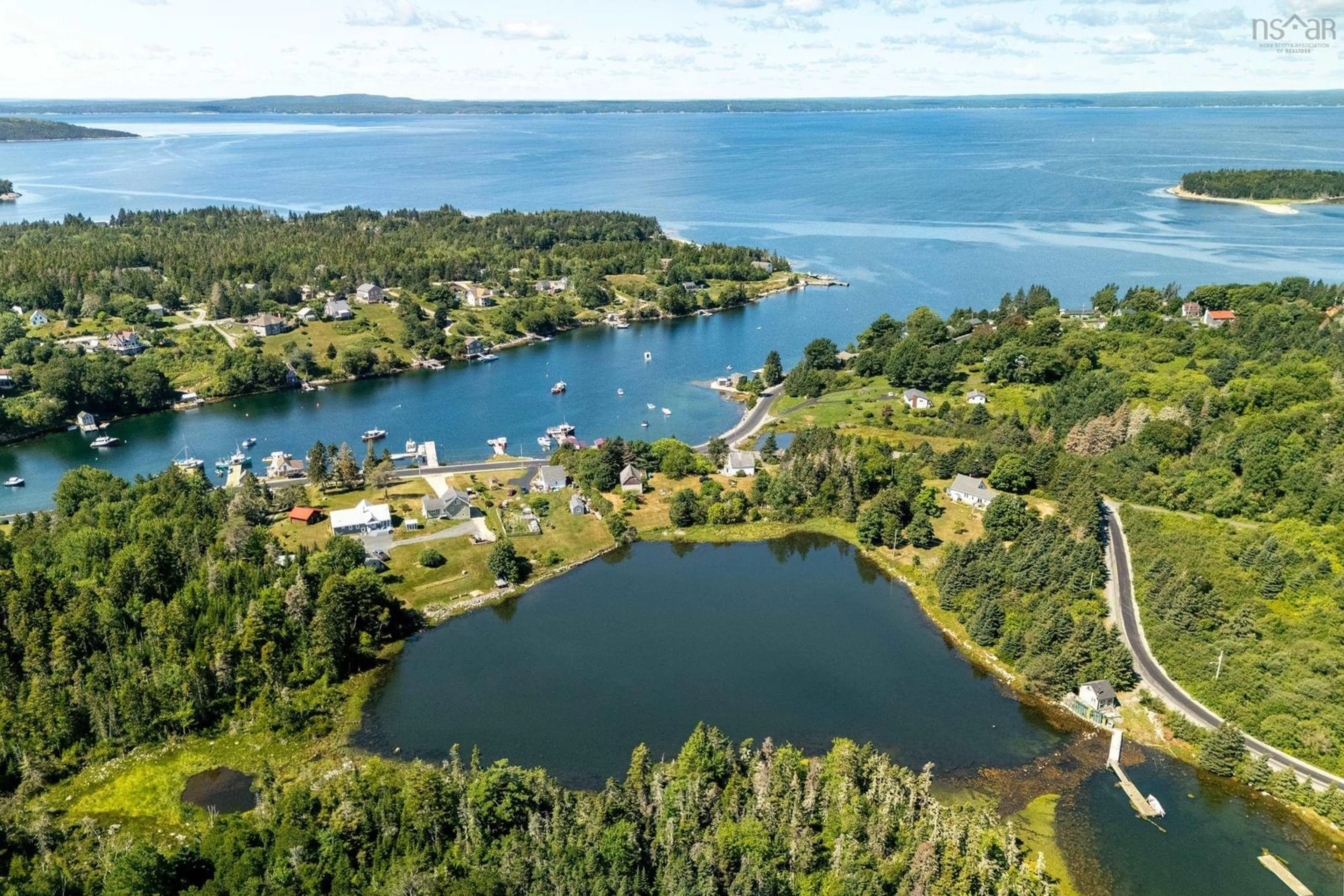 A pic from outside/outdoor area/front of a property/back of a property/a pic from drone, water/lake/river/ocean view for 91 Boutiliers Cove Rd, Hacketts Cove Nova Scotia B3Z 3J5