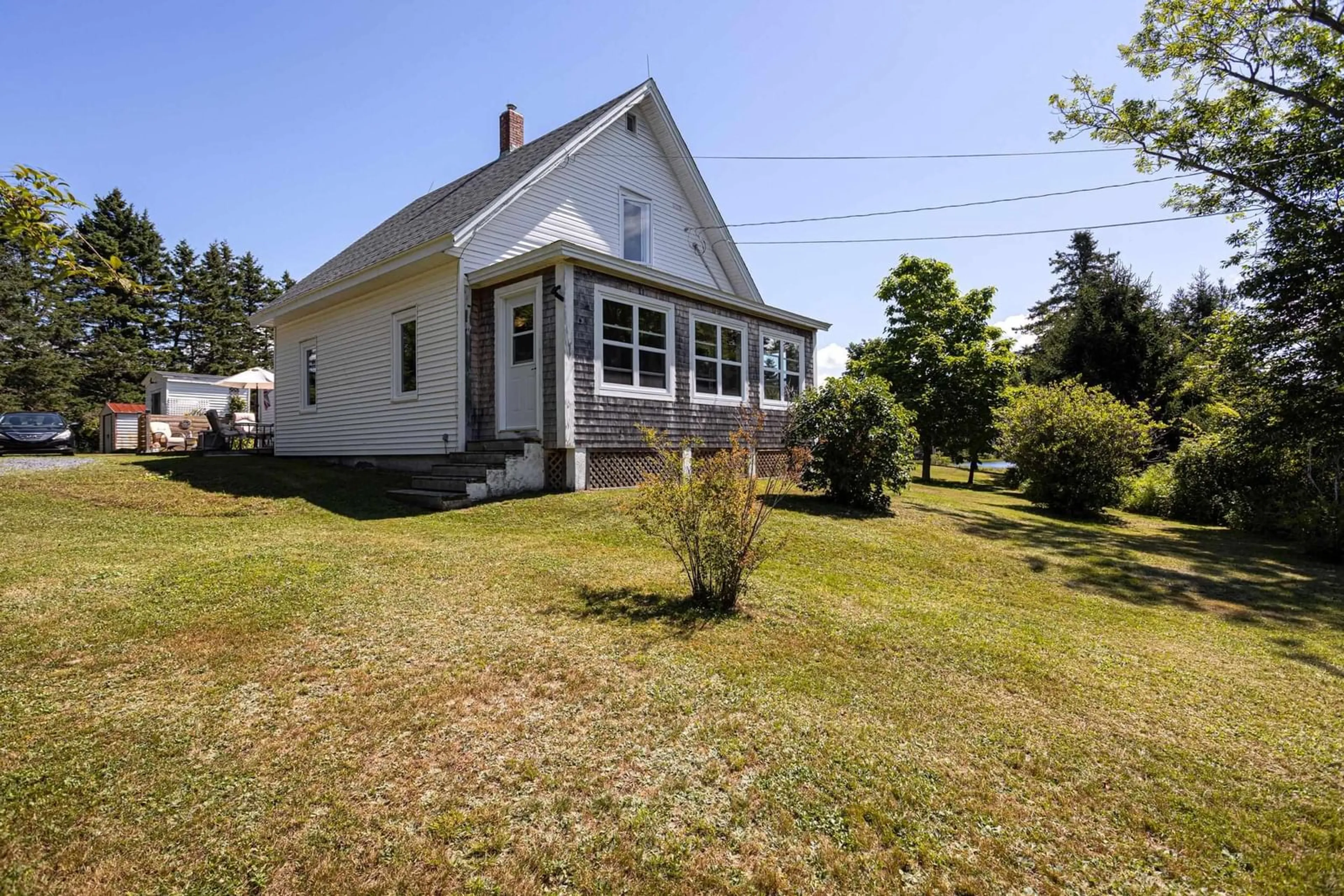 A pic from outside/outdoor area/front of a property/back of a property/a pic from drone, street for 91 Boutiliers Cove Rd, Hacketts Cove Nova Scotia B3Z 3J5