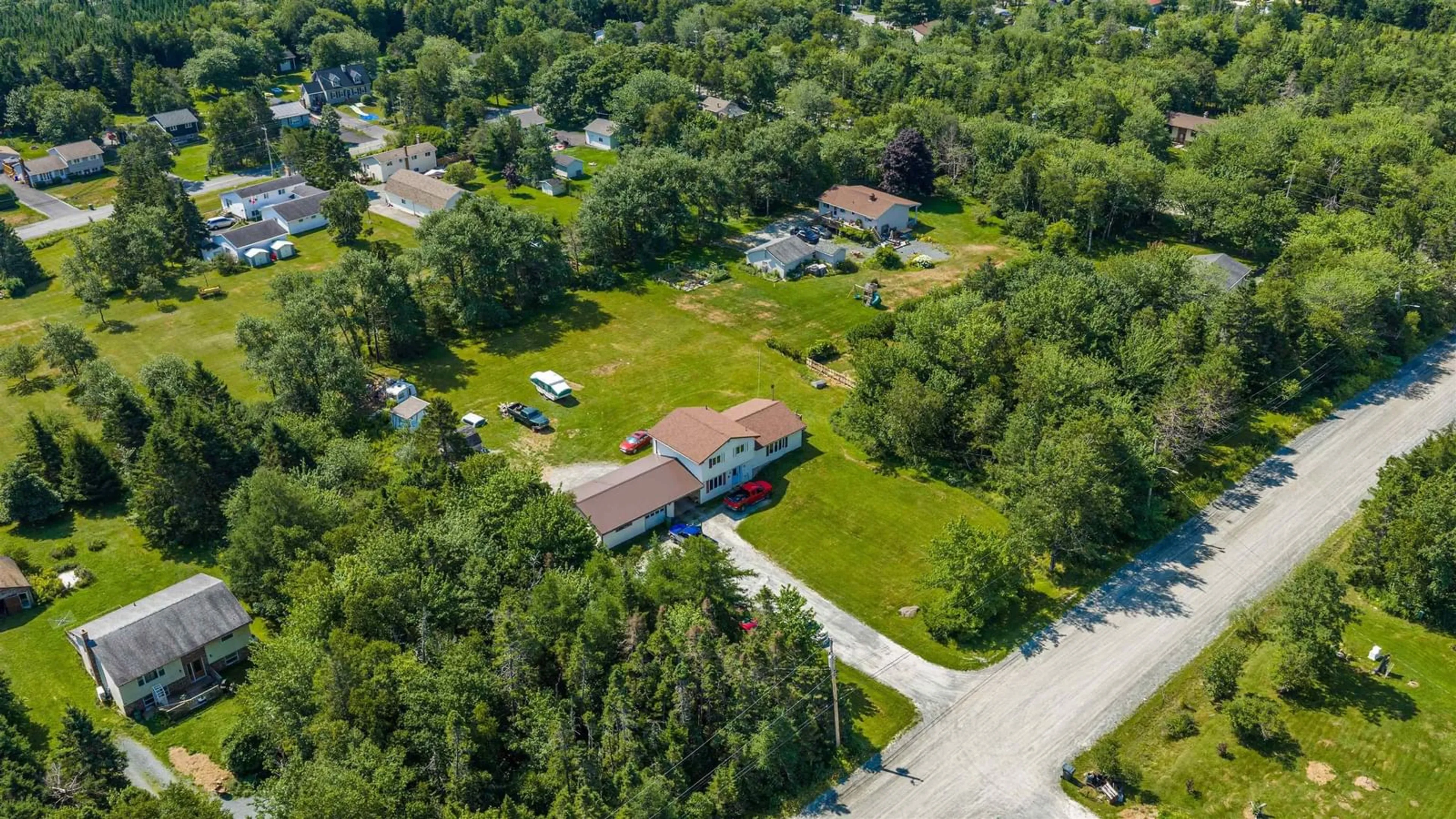 A pic from outside/outdoor area/front of a property/back of a property/a pic from drone, street for 1 Laura Dr, Cow Bay Nova Scotia B3G 1K3
