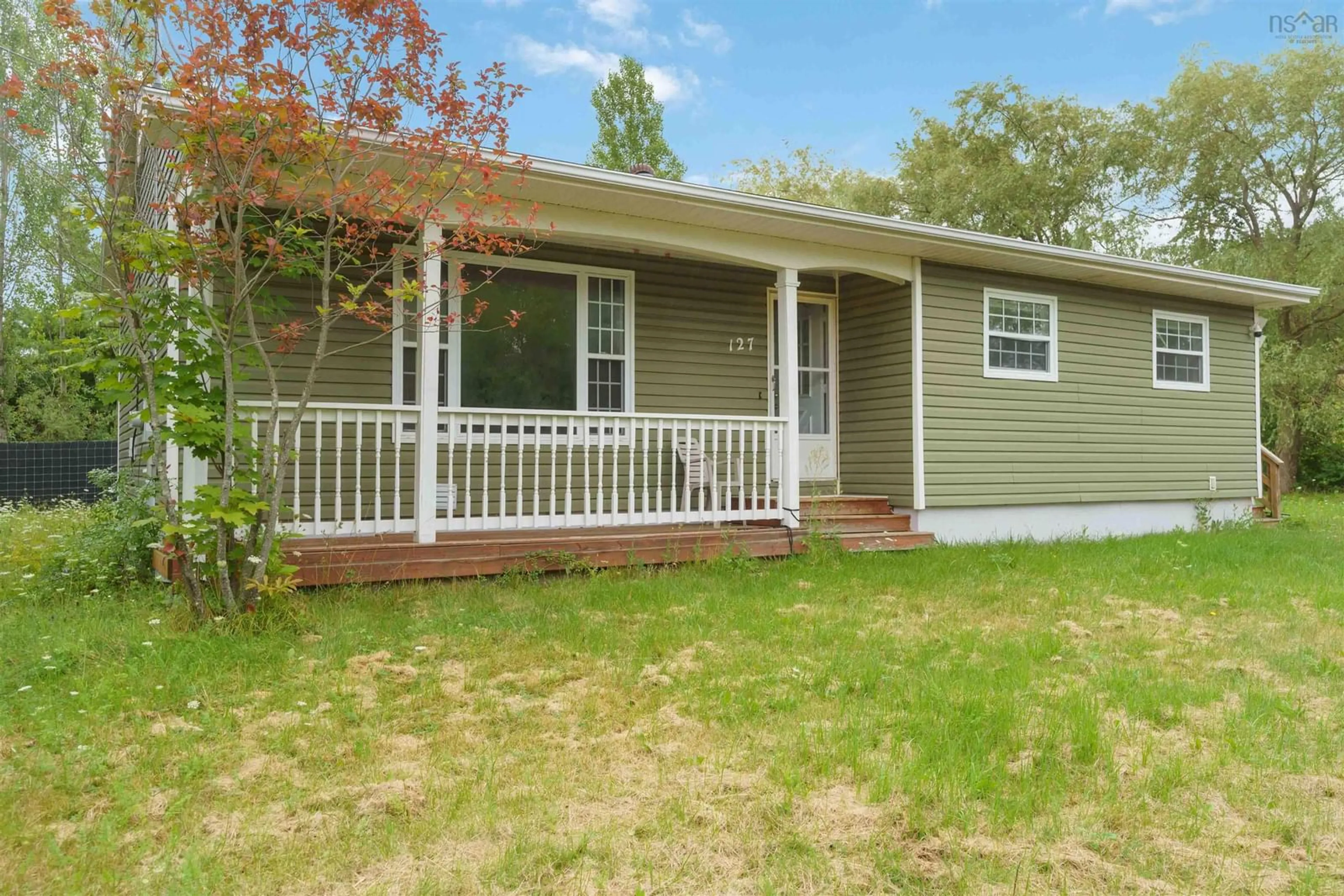 Home with vinyl exterior material, street for 127 Highland Ave, Wolfville Nova Scotia B4P 1Z8