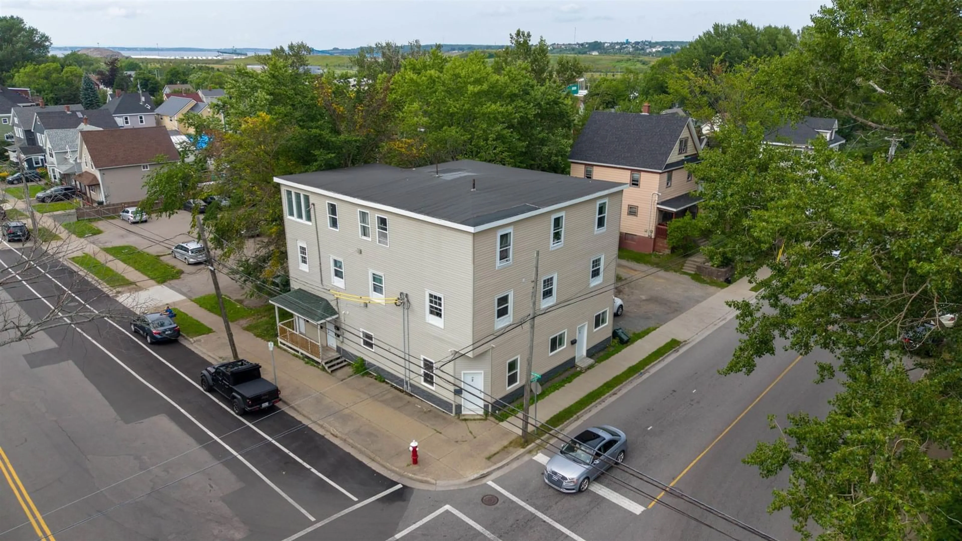A pic from outside/outdoor area/front of a property/back of a property/a pic from drone, building for 181 George St, Sydney Nova Scotia B1P 1J1