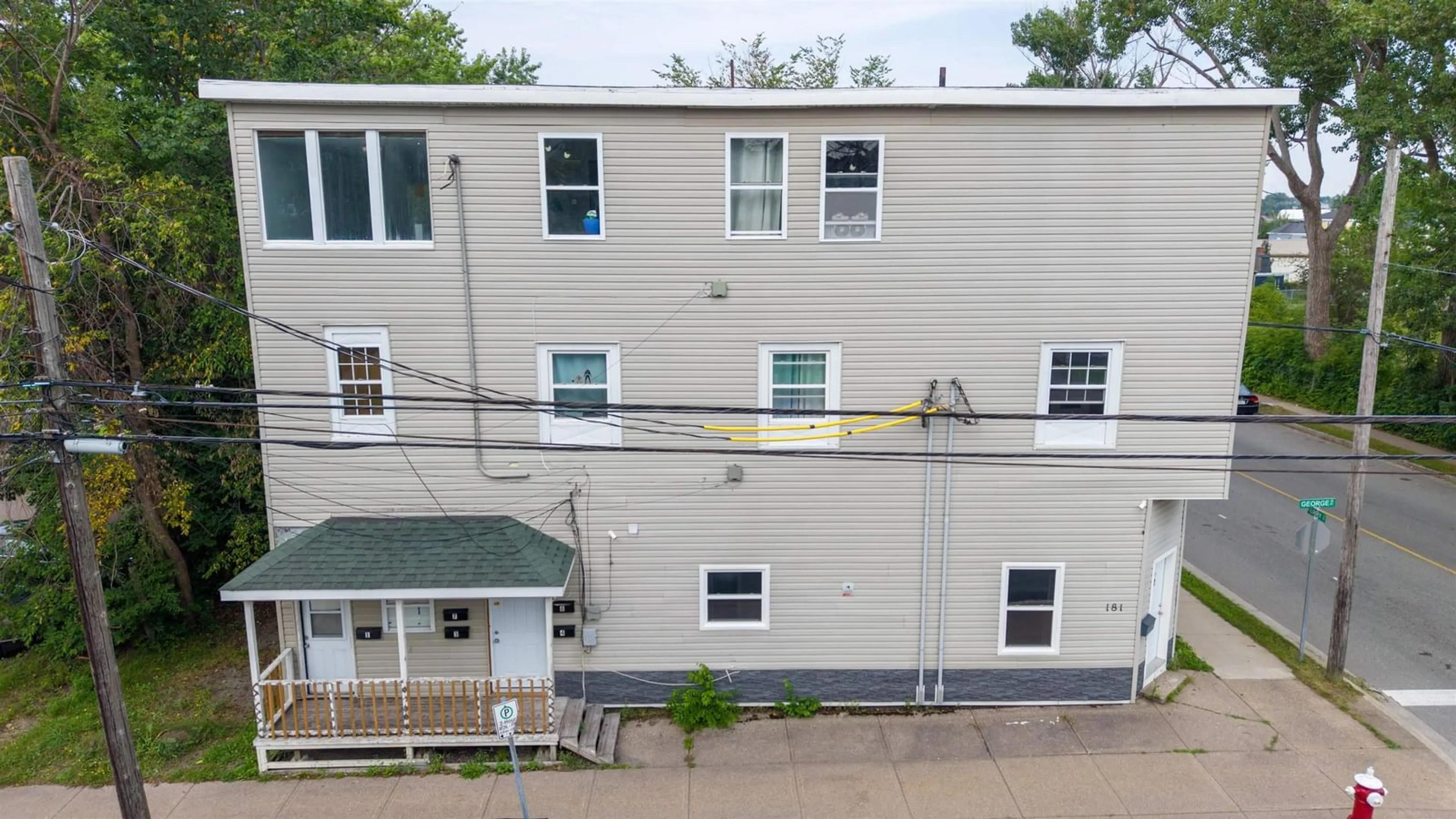 A pic from outside/outdoor area/front of a property/back of a property/a pic from drone, building for 181 George St, Sydney Nova Scotia B1P 1J1