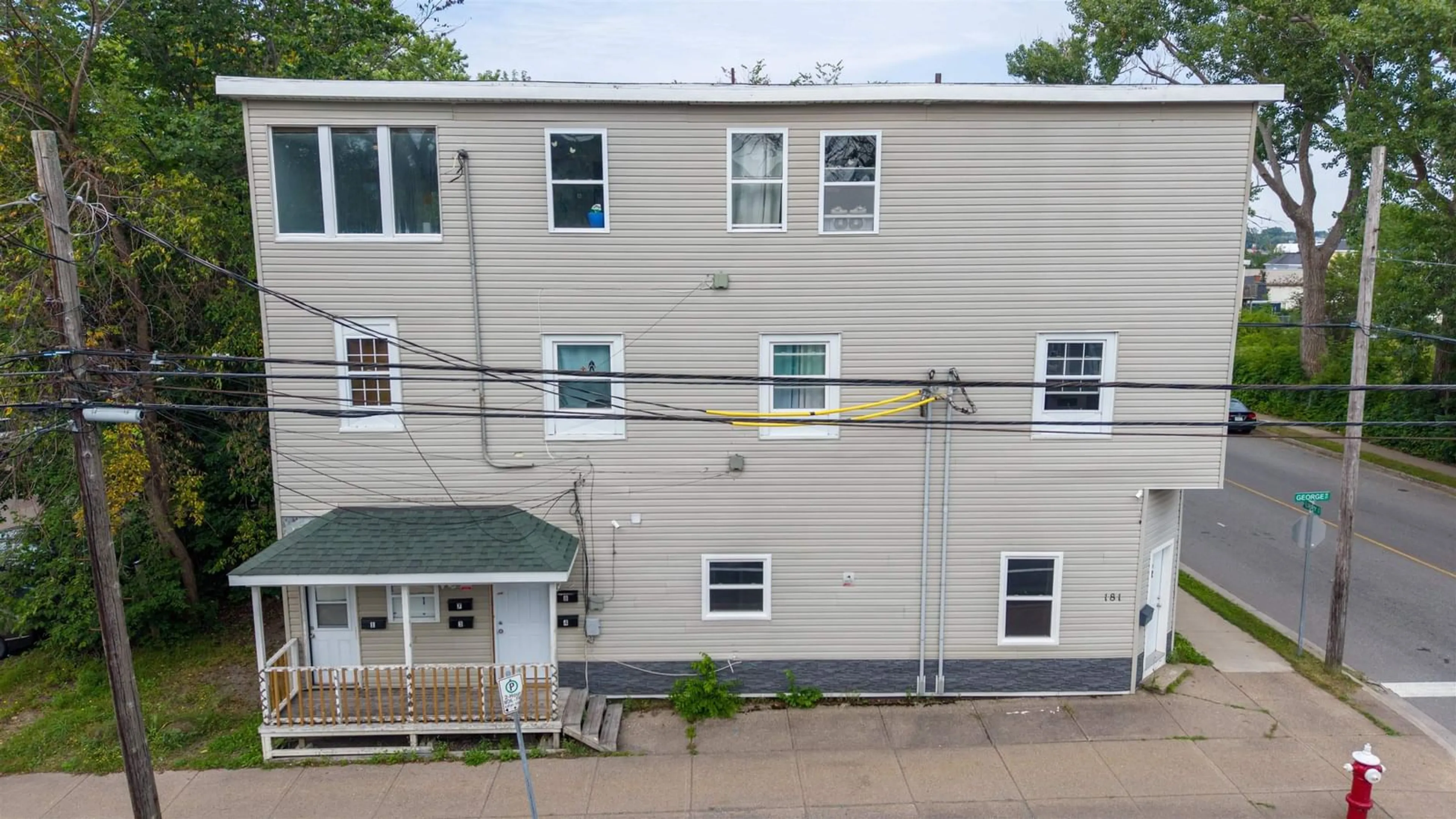 A pic from outside/outdoor area/front of a property/back of a property/a pic from drone, building for 181 George St, Sydney Nova Scotia B1P 1J1