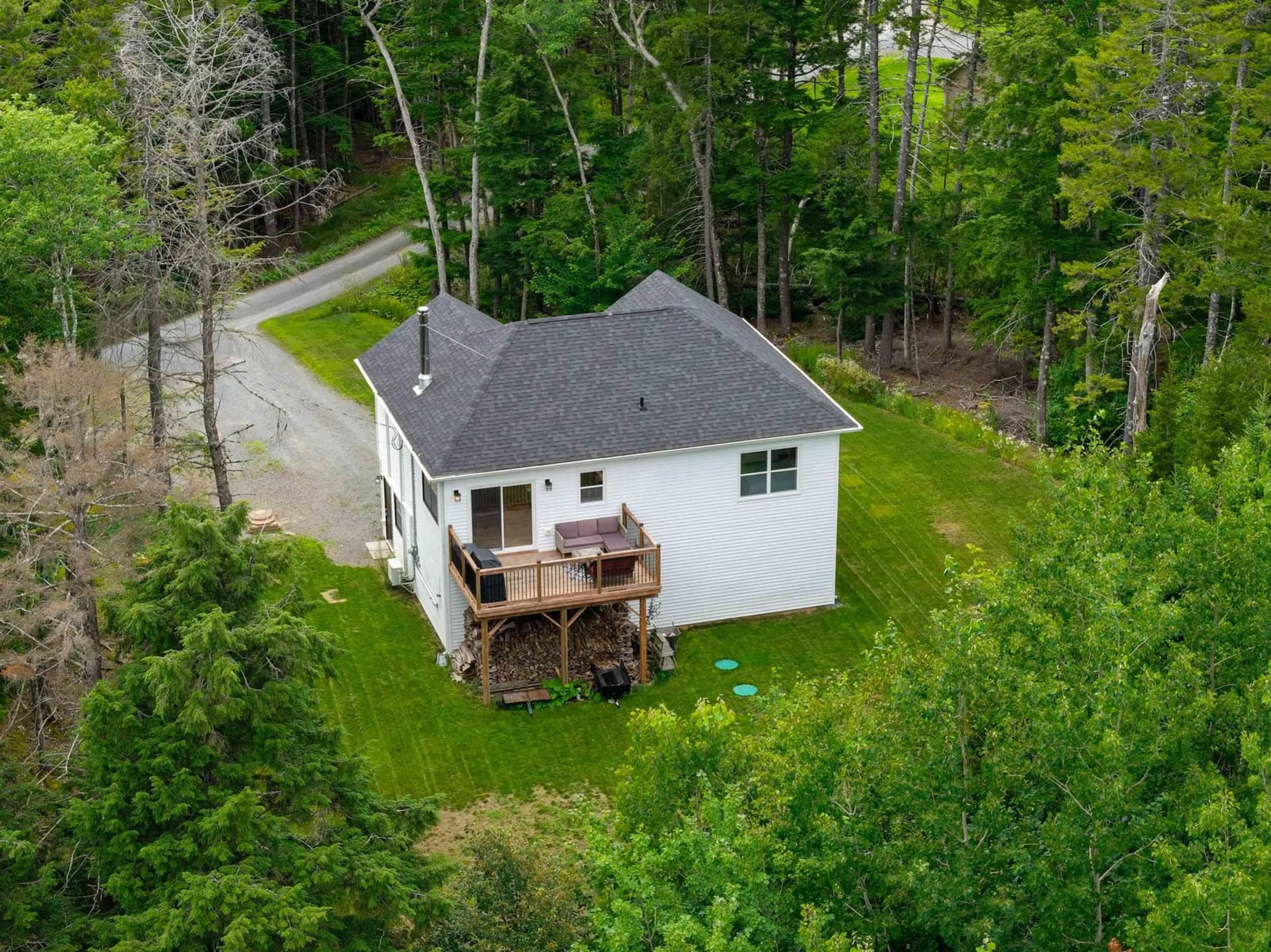 A pic from outside/outdoor area/front of a property/back of a property/a pic from drone, water/lake/river/ocean view for 46 Chalet Lane, Beaver Bank Nova Scotia B4G 0B6