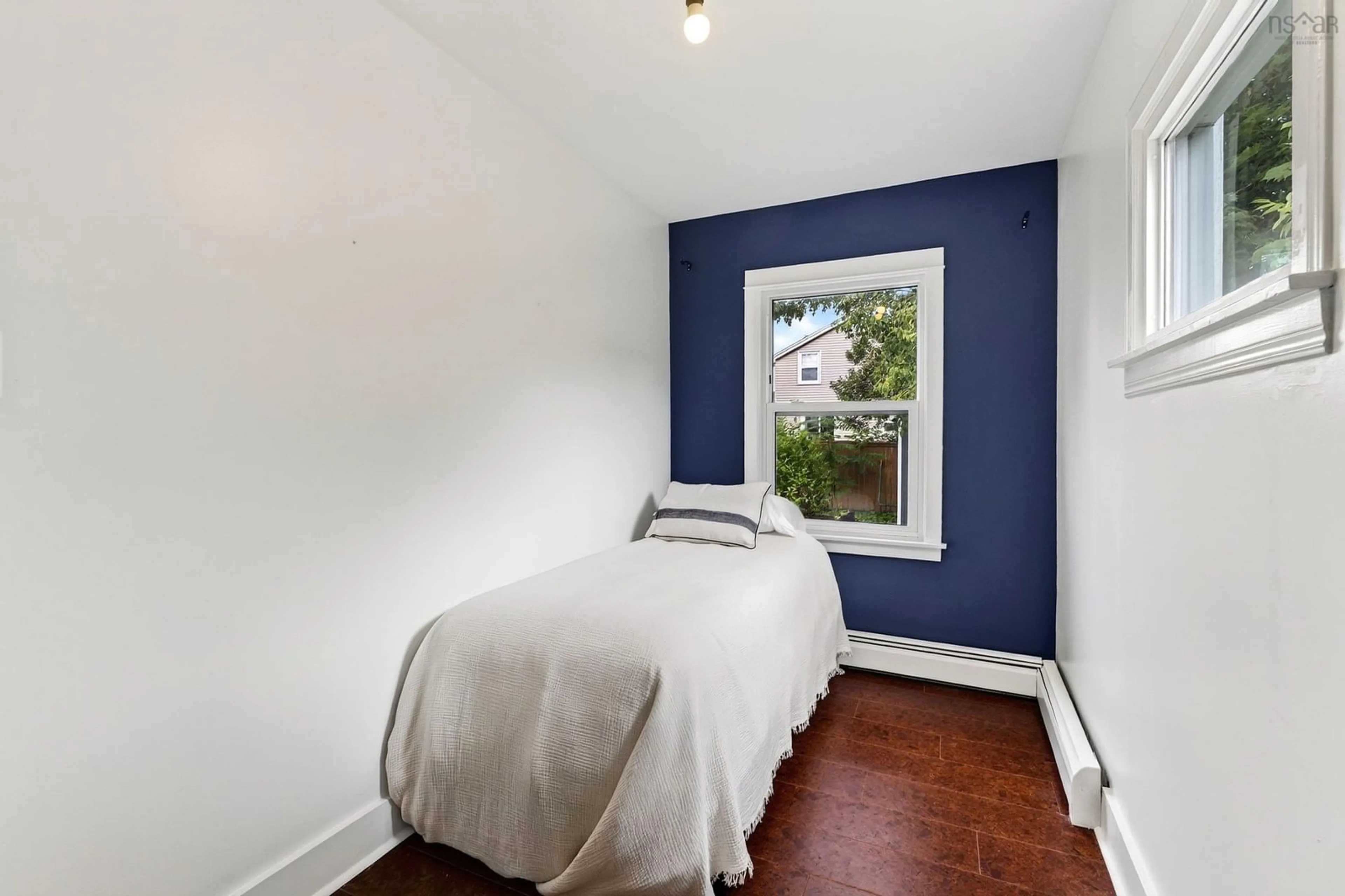 Bedroom with bed, wood/laminate floor for 1 Piers Ave, Fairmount Nova Scotia B3N 1Z2