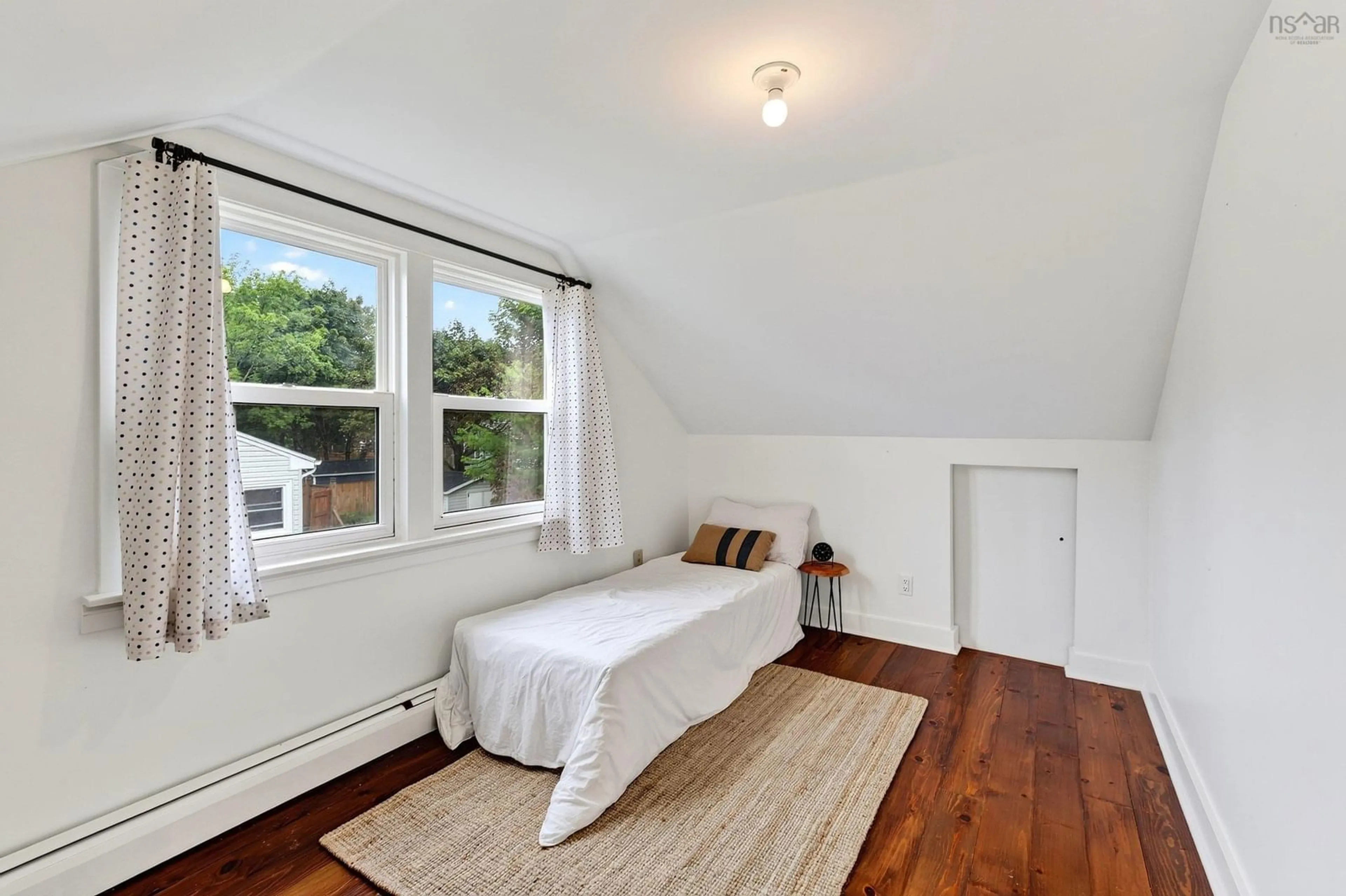 Bedroom with bed, wood/laminate floor for 1 Piers Ave, Fairmount Nova Scotia B3N 1Z2