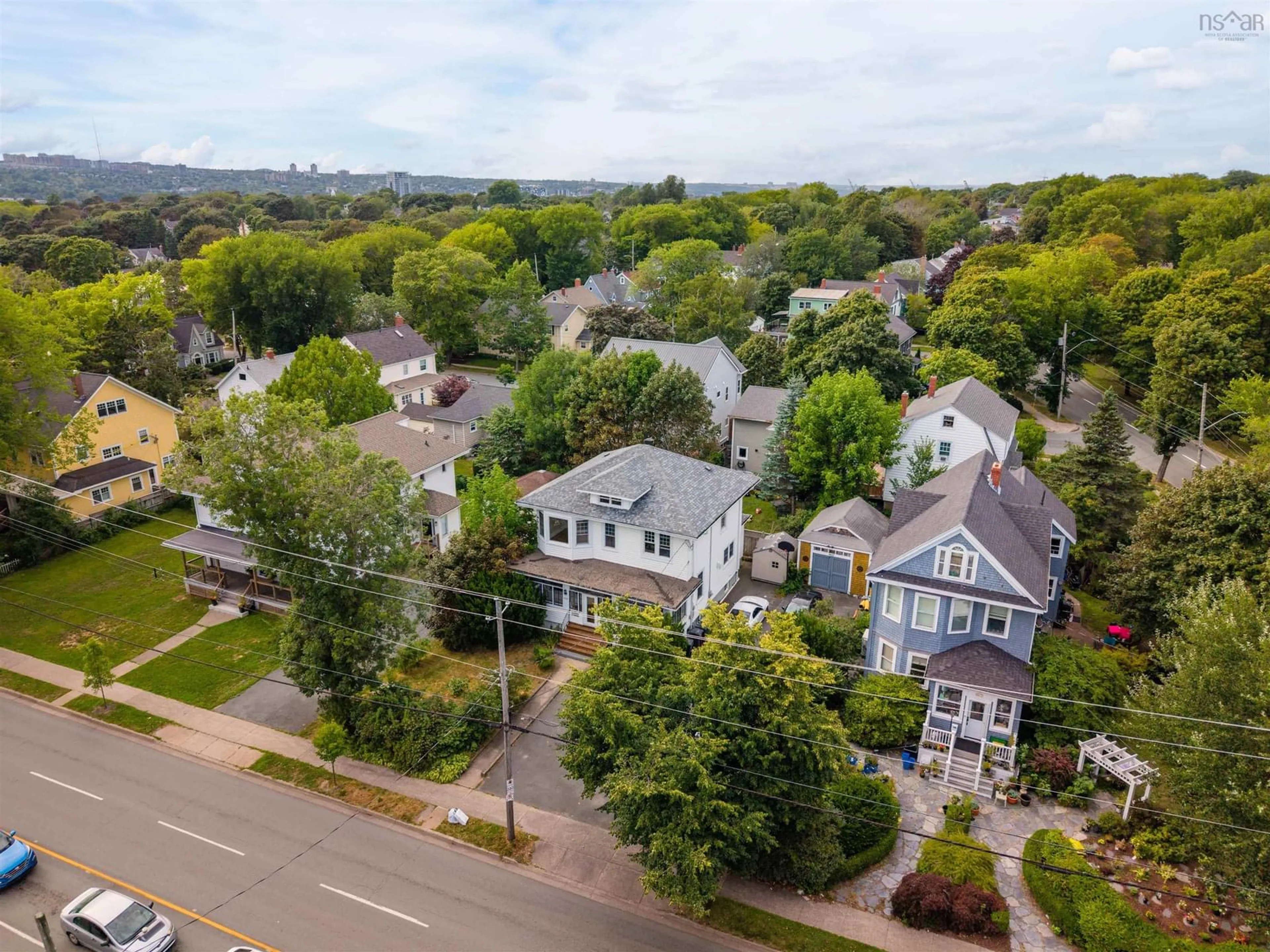 A pic from outside/outdoor area/front of a property/back of a property/a pic from drone, street for 6625 Quinpool Rd, Halifax Nova Scotia B3L 1B7