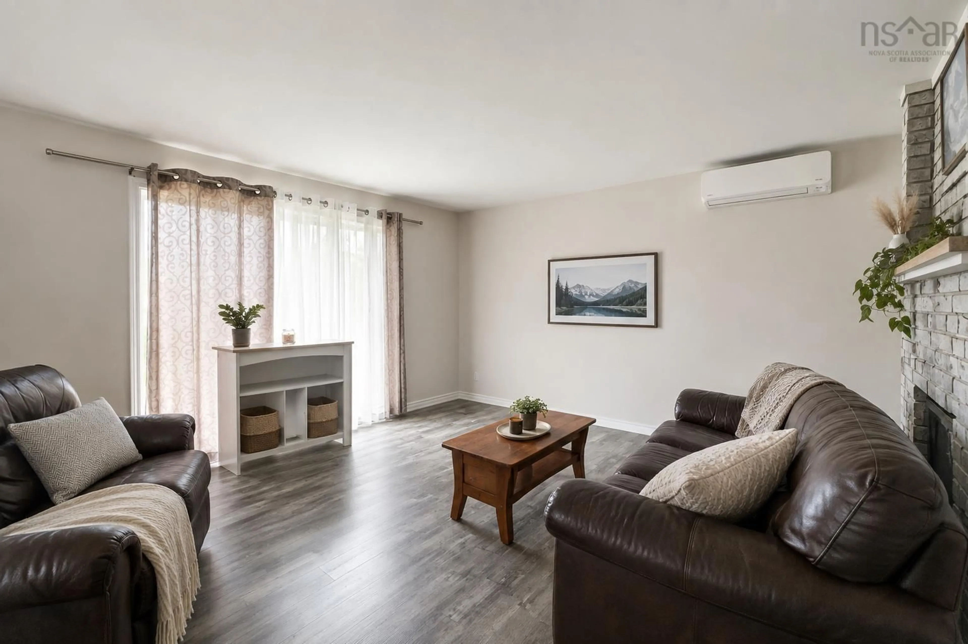 Living room with furniture, wood/laminate floor for 10 Sampson Dr, Lower Sackville Nova Scotia B4C 3E8