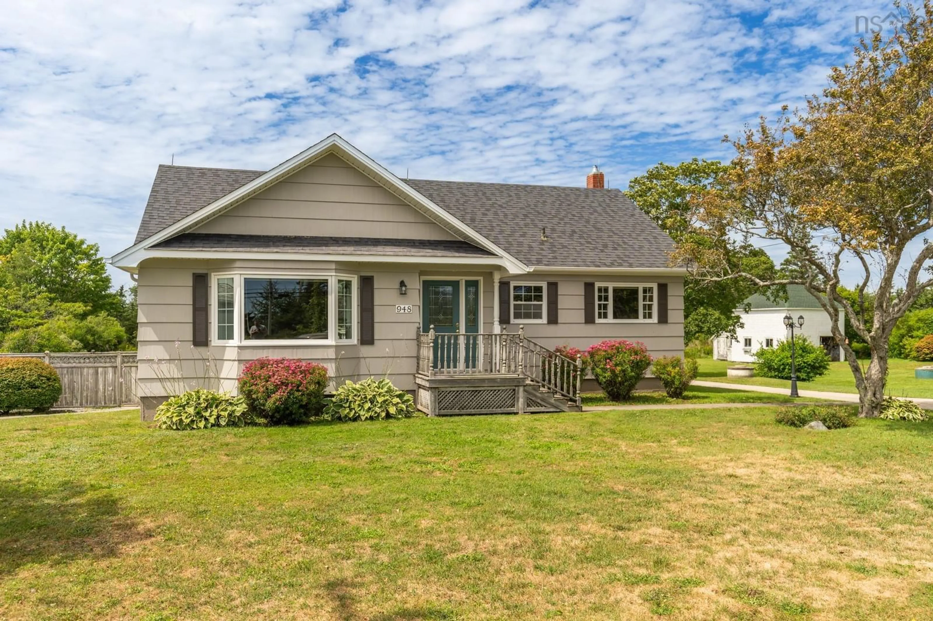 Home with vinyl exterior material, street for 948 Highway 335, West Pubnico Nova Scotia B0W 3S0