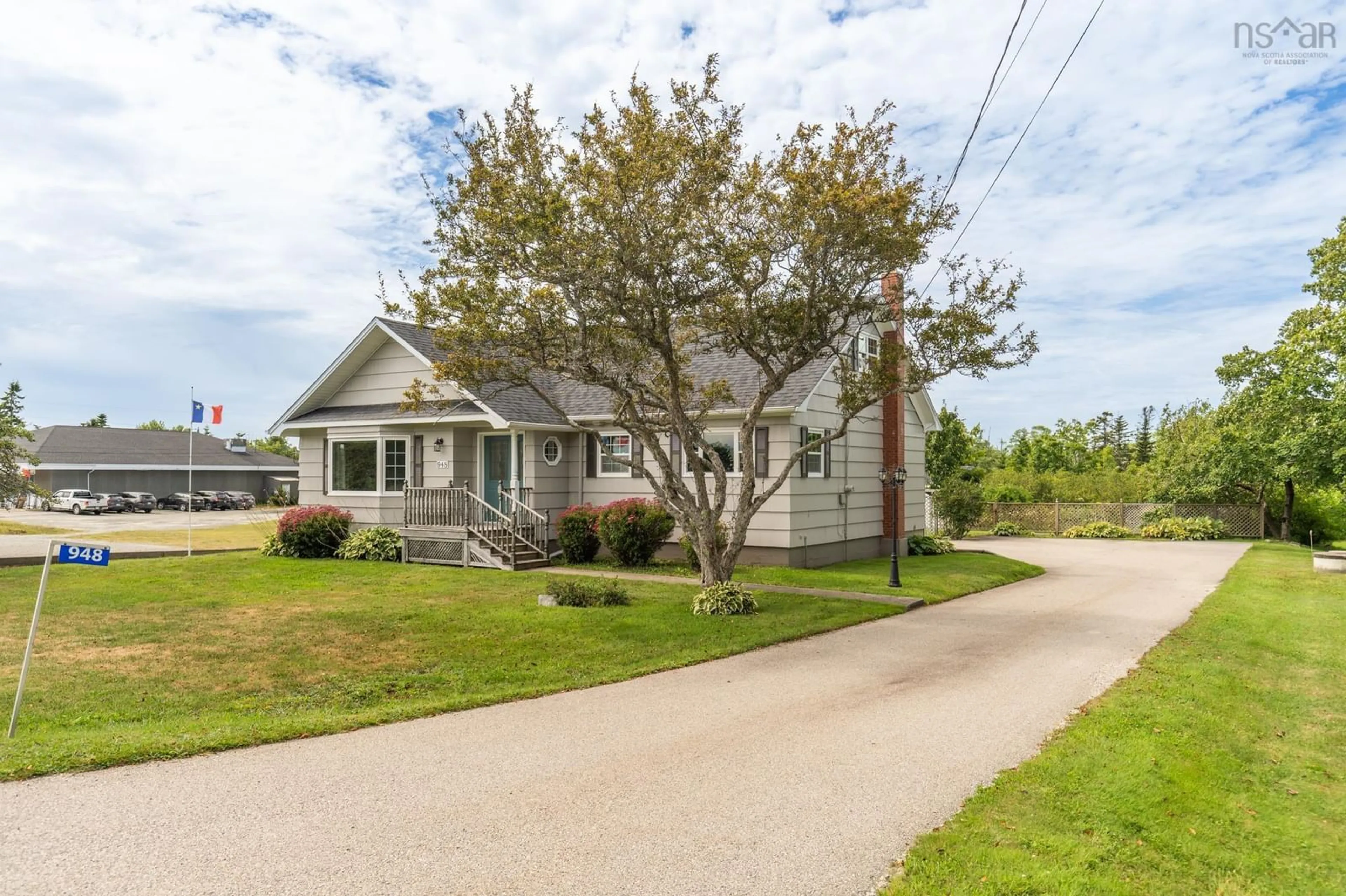 A pic from outside/outdoor area/front of a property/back of a property/a pic from drone, street for 948 Highway 335, West Pubnico Nova Scotia B0W 3S0