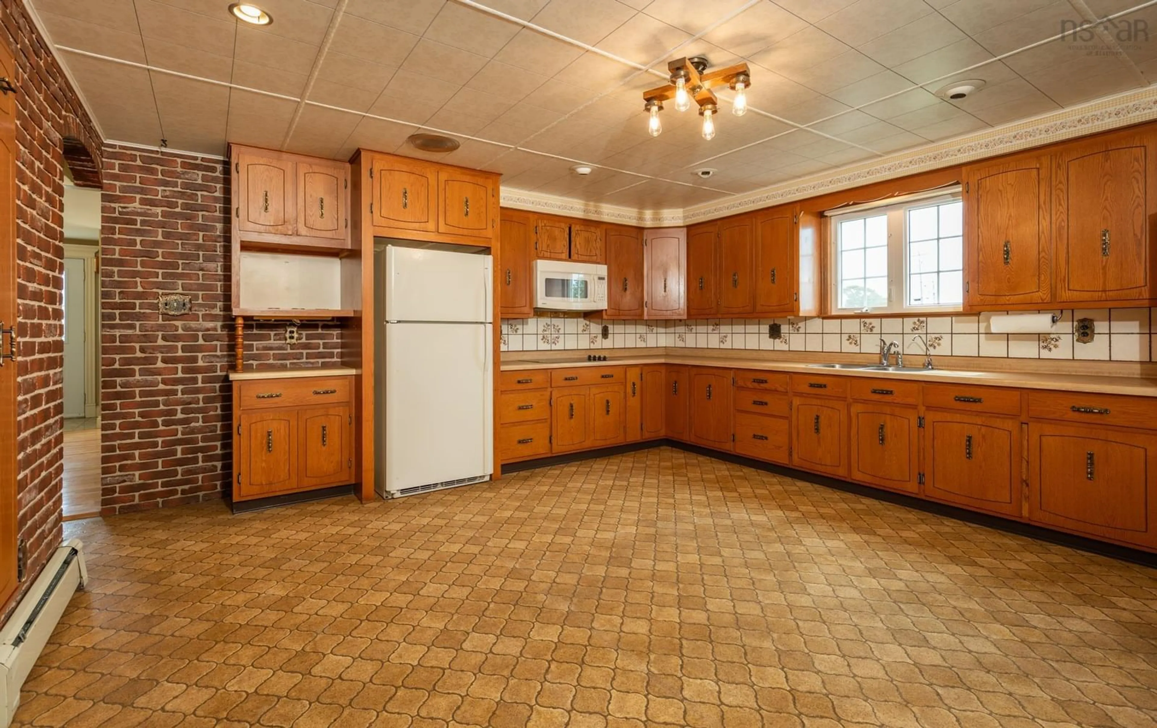 Standard kitchen, ceramic/tile floor for 948 Highway 335, West Pubnico Nova Scotia B0W 3S0