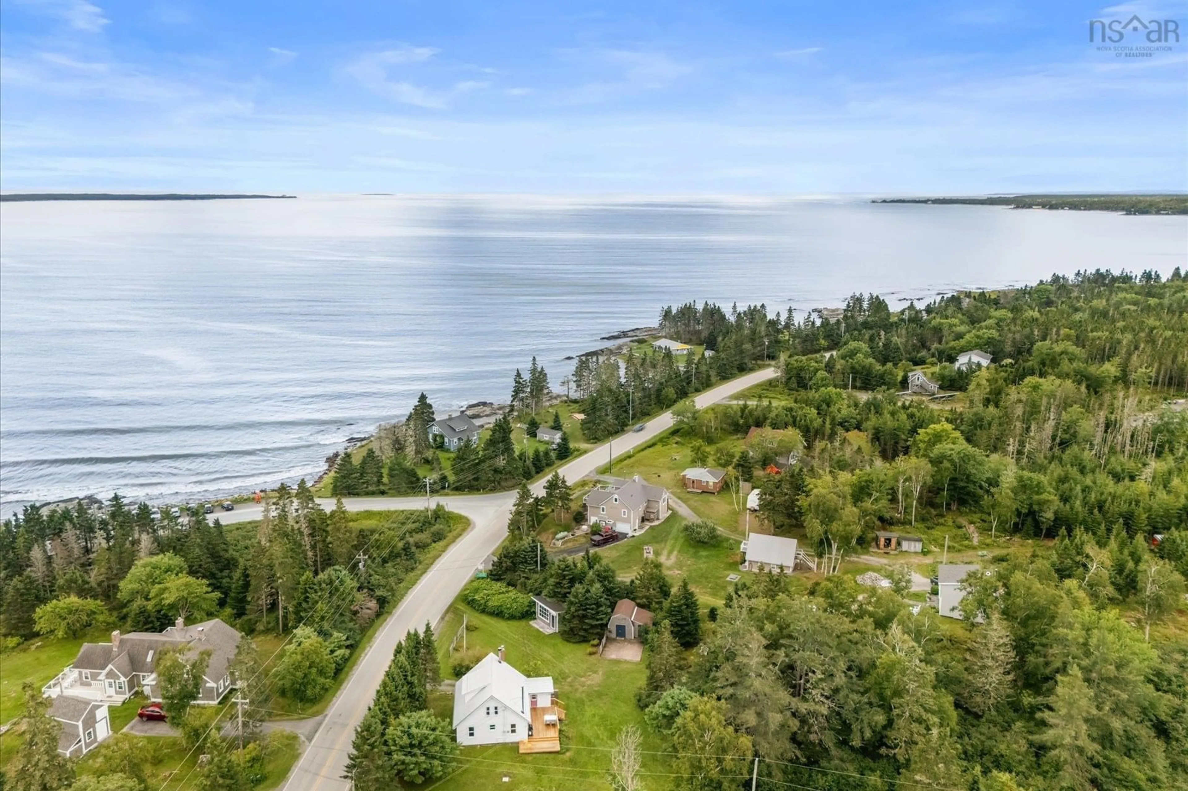 A pic from outside/outdoor area/front of a property/back of a property/a pic from drone, water/lake/river/ocean view for 5192 331 Hwy, Crescent Beach Nova Scotia B0R 1C0