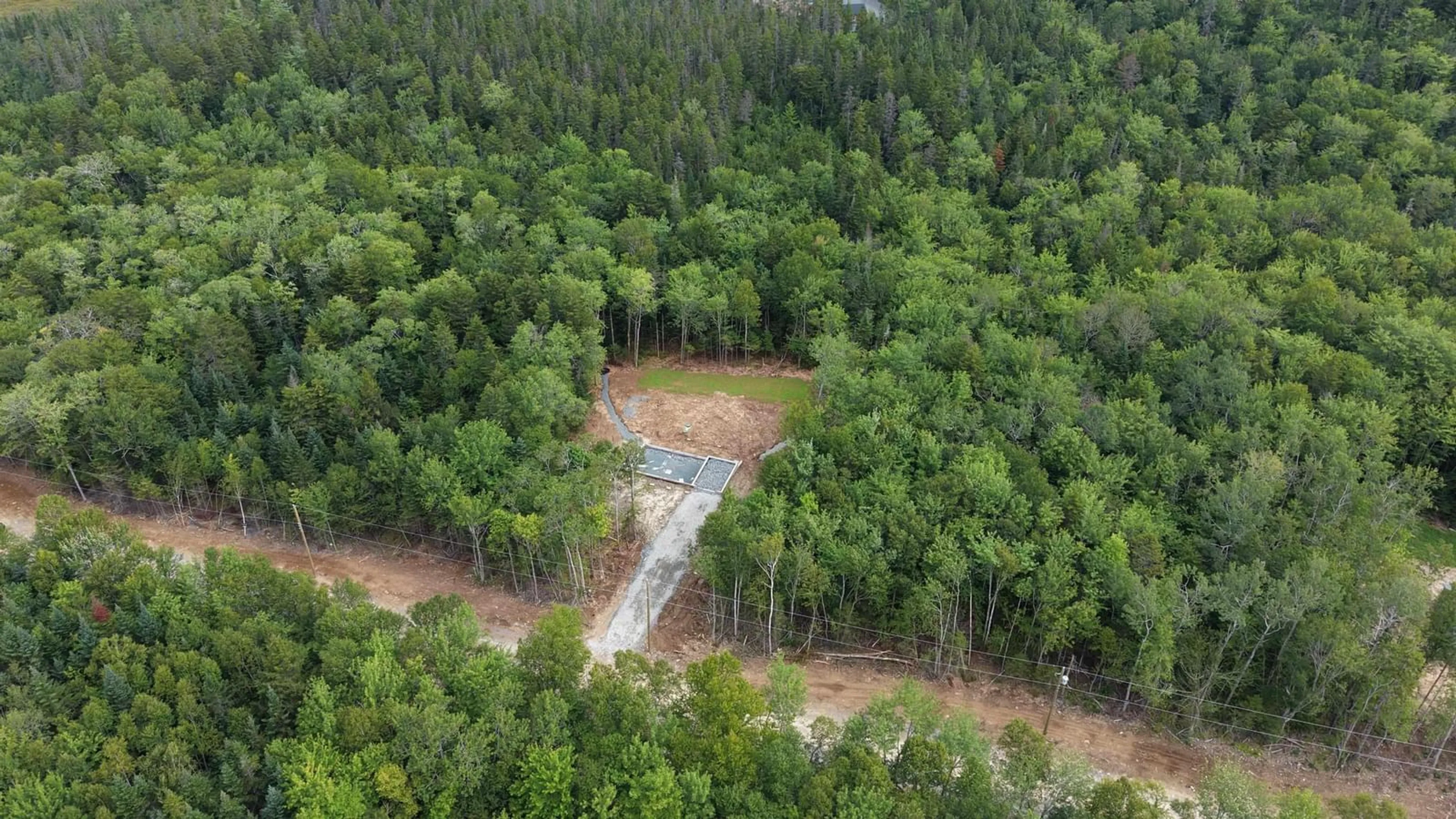 A pic from outside/outdoor area/front of a property/back of a property/a pic from drone, forest/trees view for 82 Ronald Lane, East Uniacke Nova Scotia B0N 1Z0