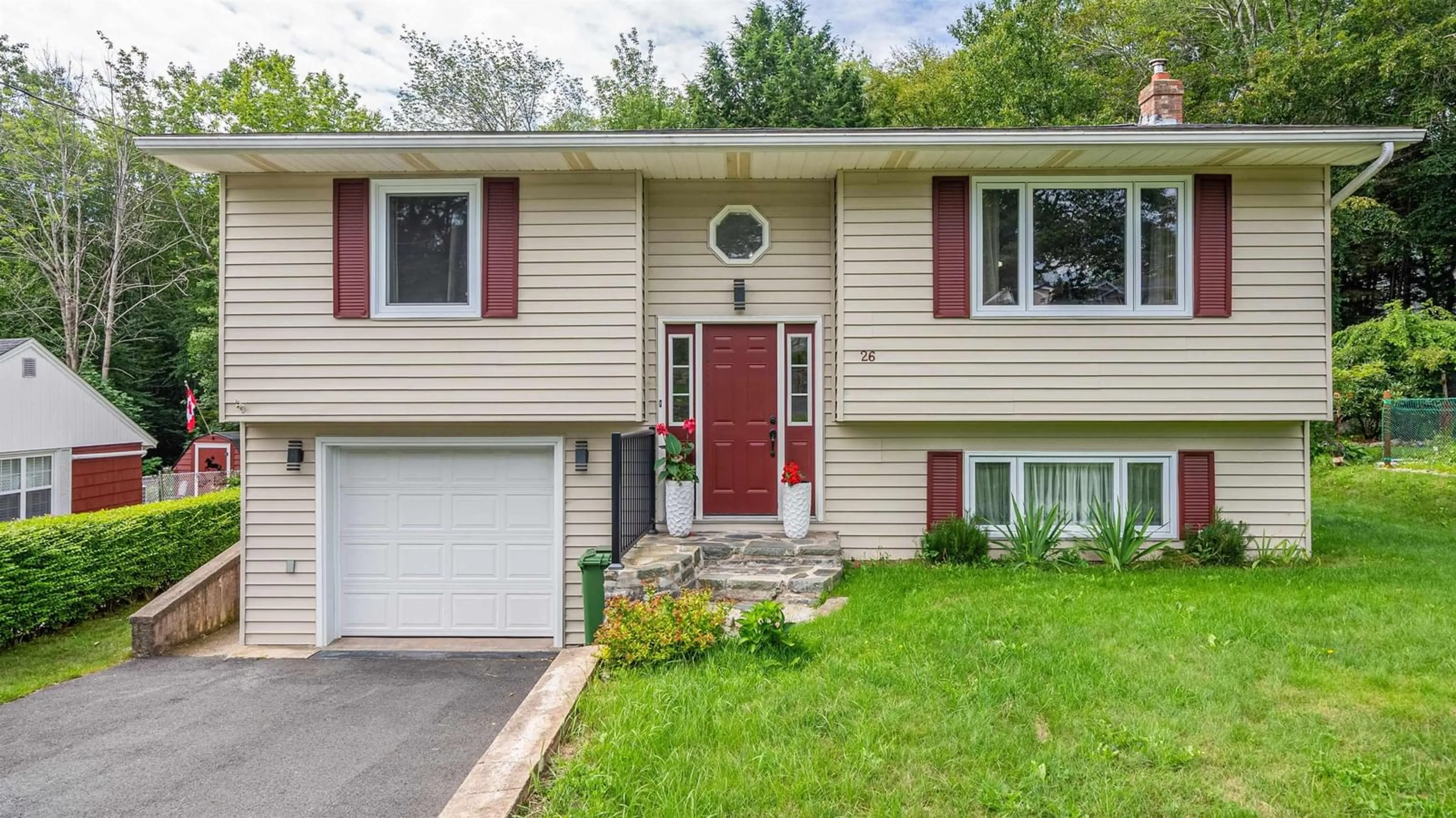 Home with vinyl exterior material, street for 26 Bridge St, Bedford Nova Scotia B4A 2C1