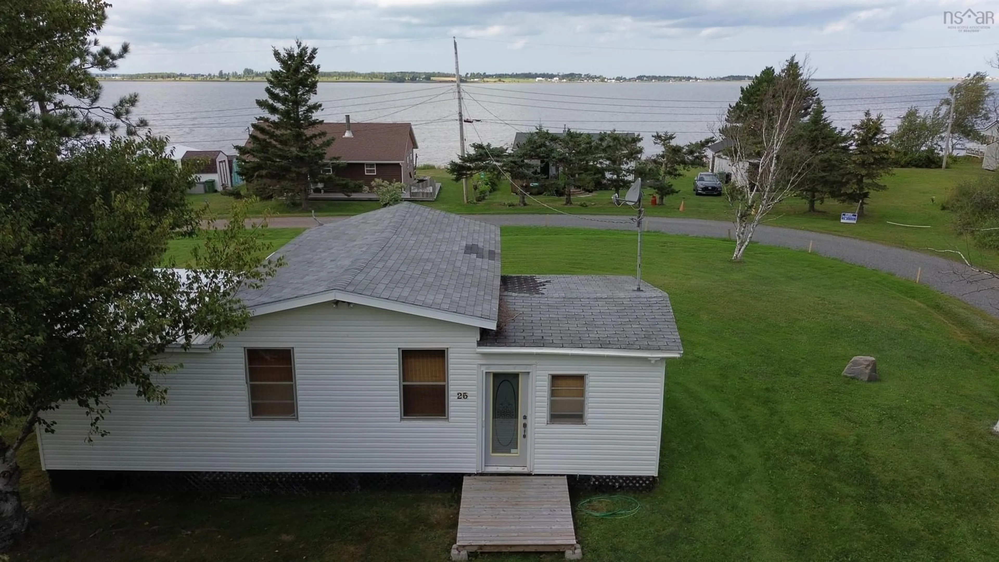 A pic from outside/outdoor area/front of a property/back of a property/a pic from drone, water/lake/river/ocean view for 25 Sunset Dr, Brule Nova Scotia B0K 1V0