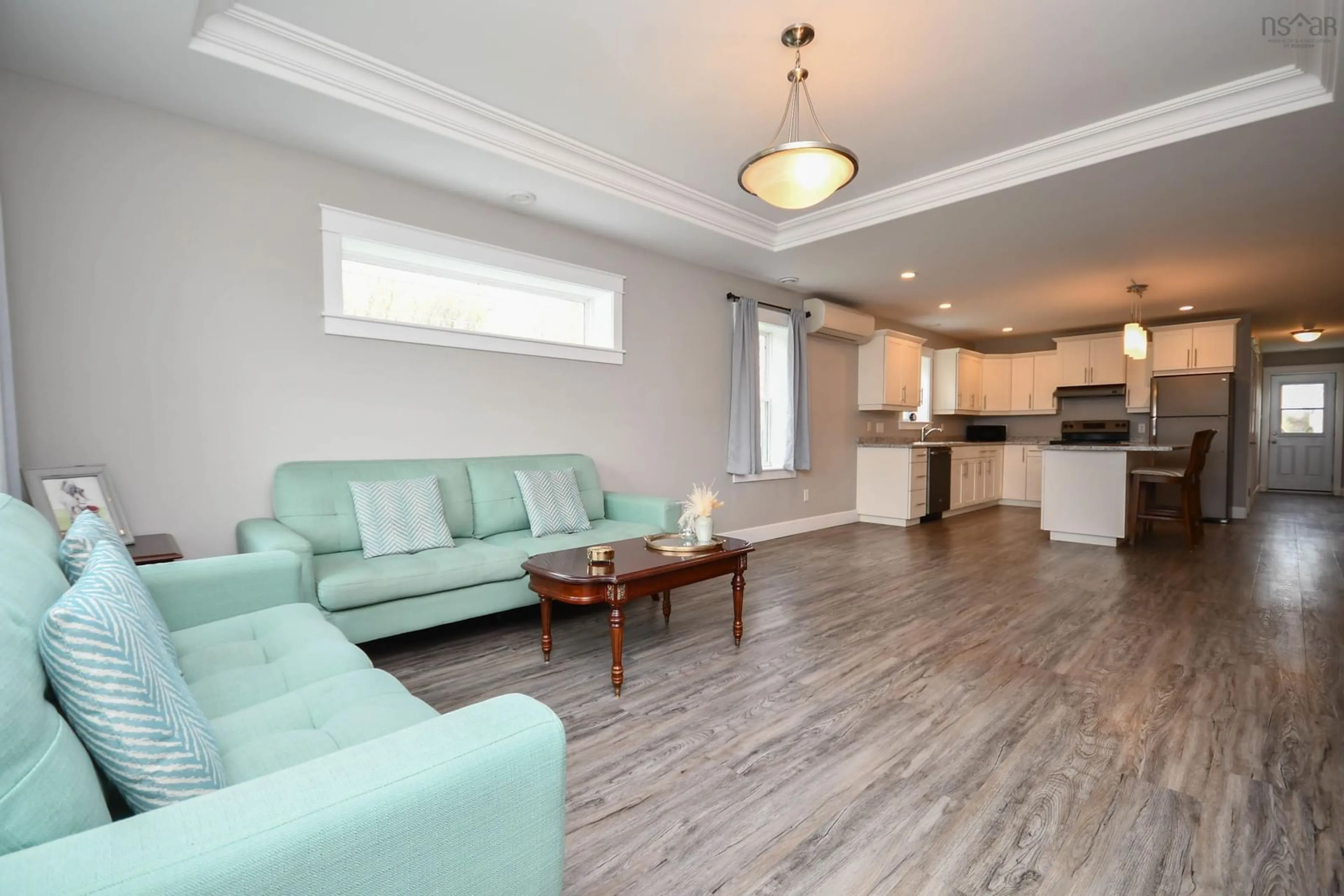 Living room with furniture, wood/laminate floor for 36 Nita Dr, Brookside Nova Scotia B2N 6G7