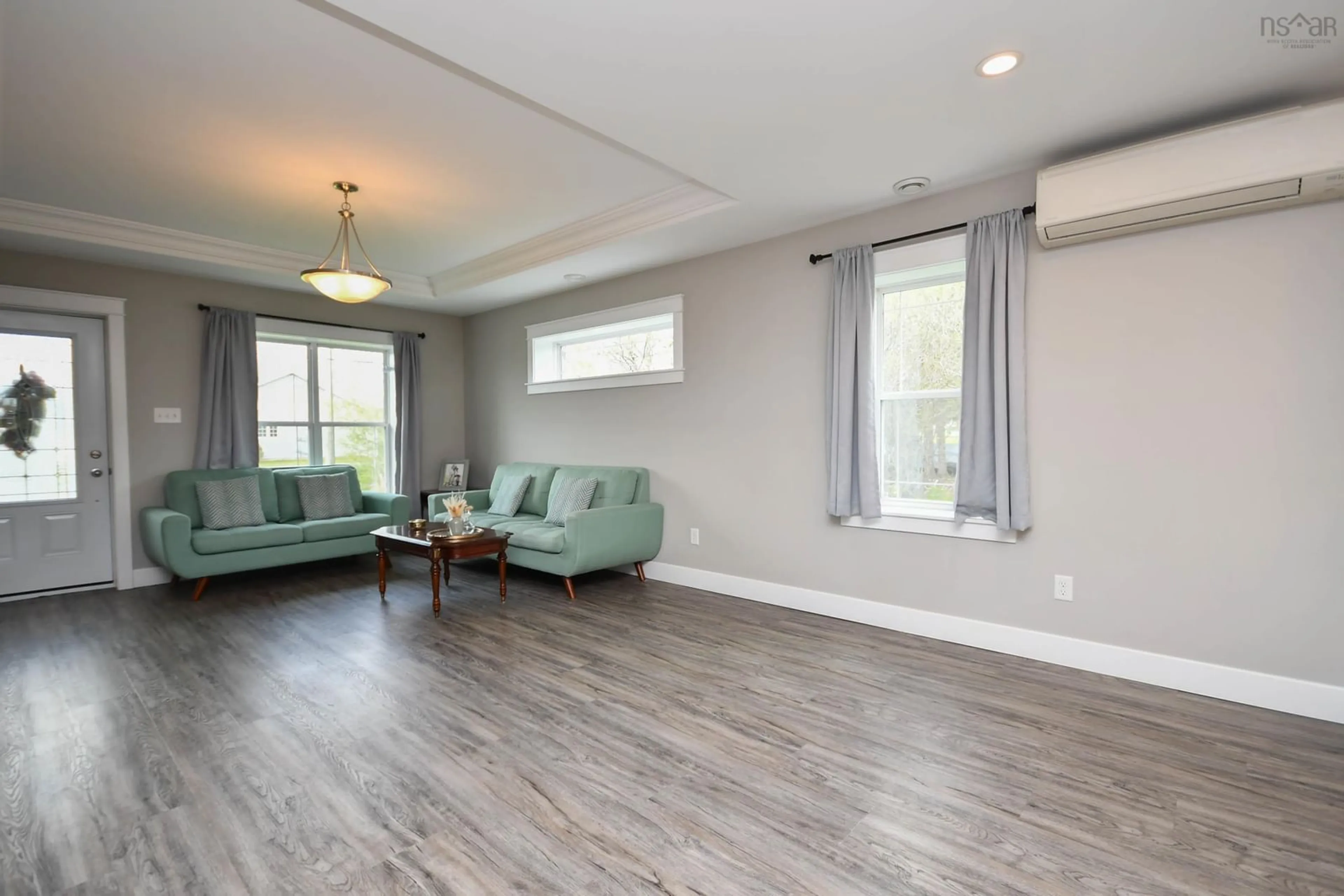 Living room with furniture, wood/laminate floor for 36 Nita Dr, Brookside Nova Scotia B2N 6G7