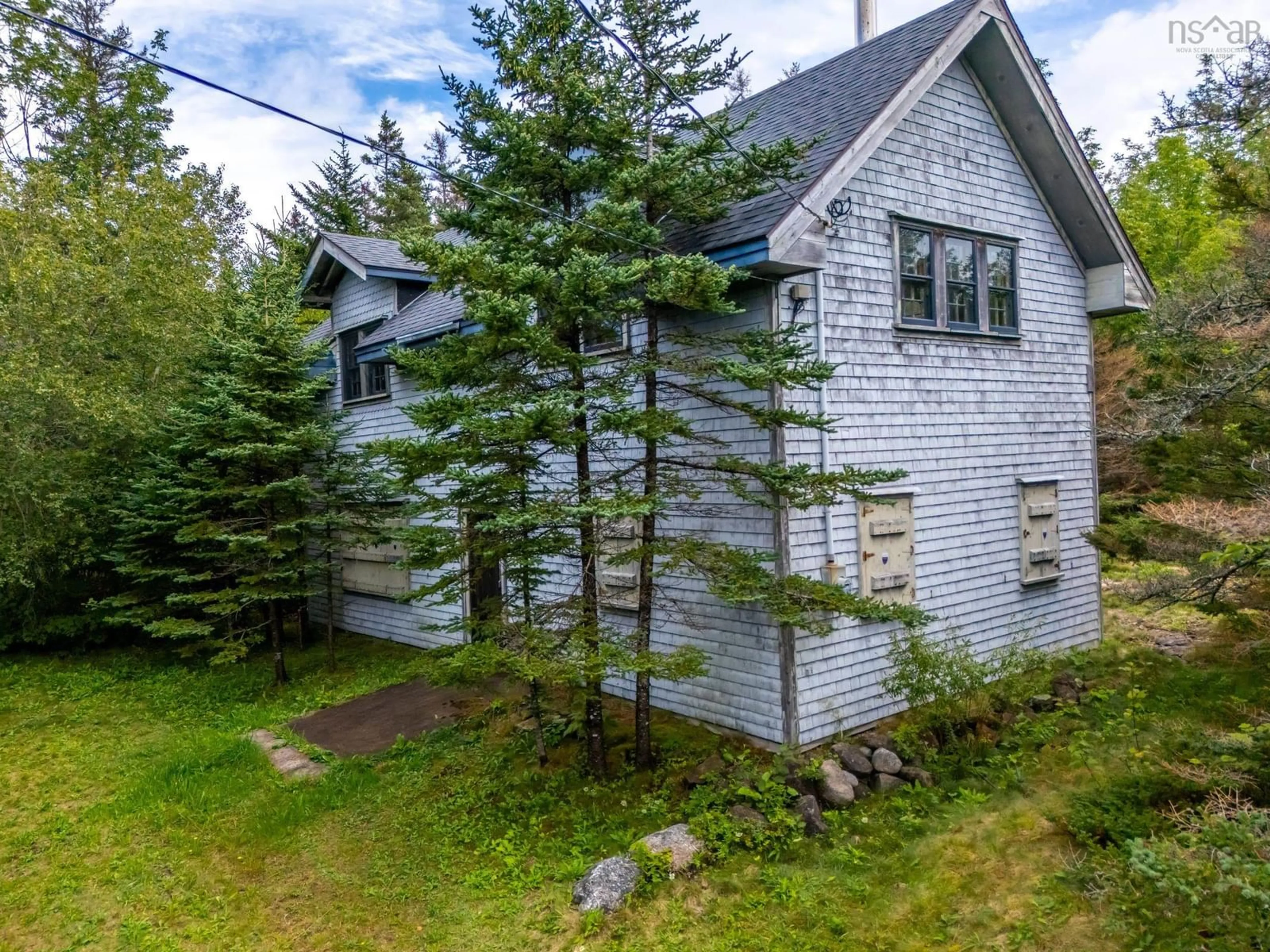 A pic from outside/outdoor area/front of a property/back of a property/a pic from drone, unknown for 7656 Shore Rd, Hampton Nova Scotia B0S 1L0